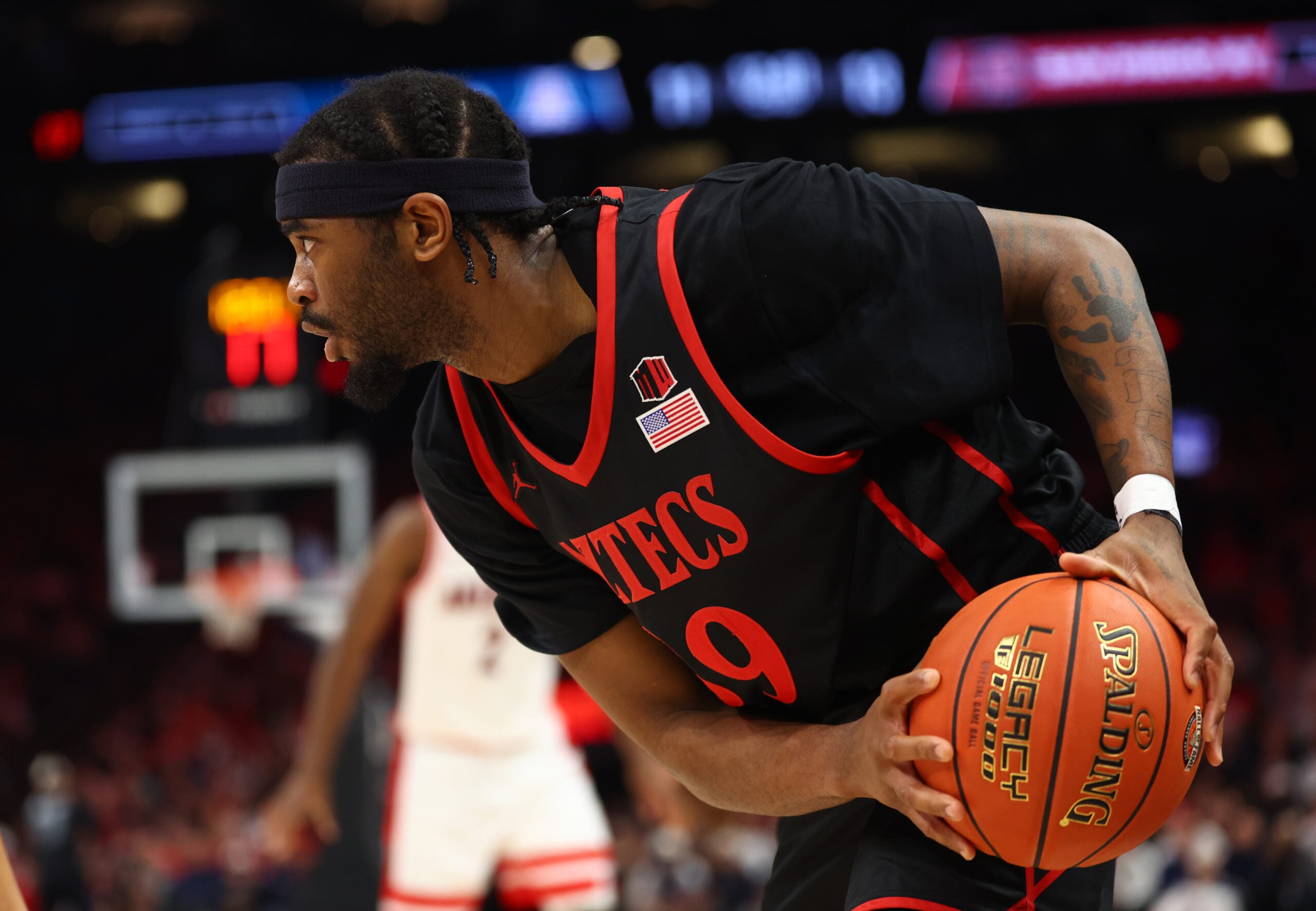 Dec 20, 2025; Phoenix, Arizona, USA; San Diego State Aztecs guard Reese Dixon-Waters (39) against the Arizona Wildcats during the Hall of Fame Series at Mortgage Matchup Center. Mandatory Credit: Mark J. Rebilas-Imagn Images