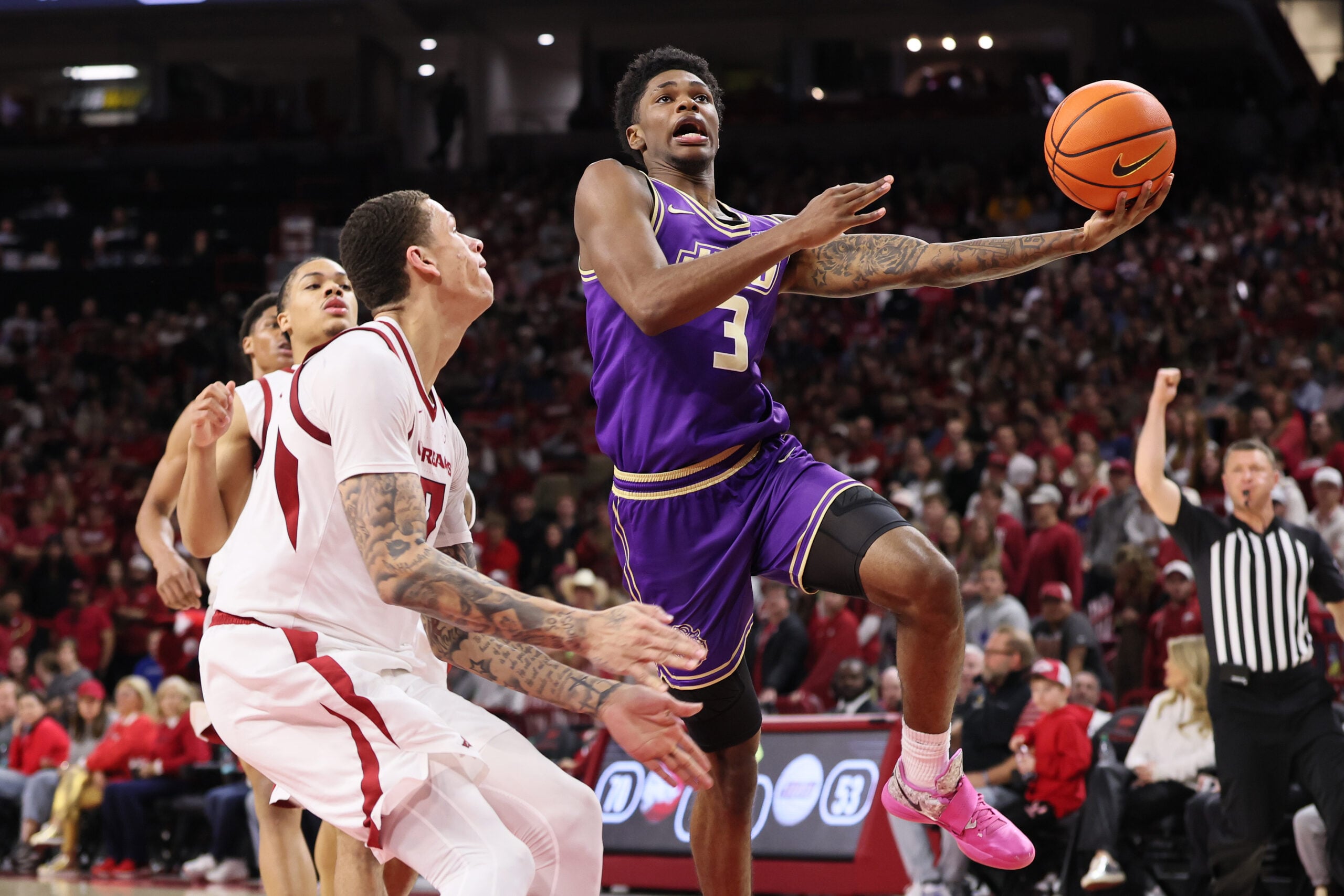Dec 29, 2025; Fayetteville, Arkansas, USA; James Madison Dukes forward Eddie Ricks III (3) attempts a shot in the second half against the Arkansas Razorbacks at Bud Walton Arena. Arkansas won 103-74. Mandatory Credit: Nelson Chenault-Imagn Images