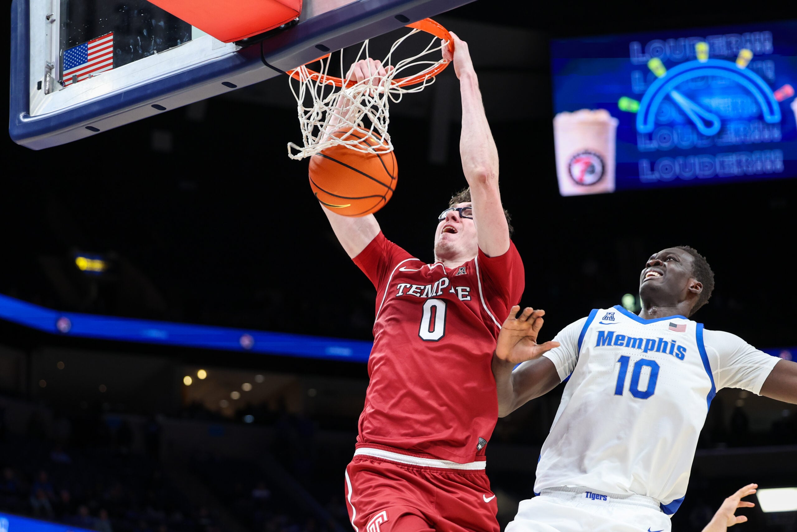 Jan 14, 2026; Memphis, Tennessee, USA; Temple Owls guard Gavin Griffiths (0) dunks the ball against the Memphis Tigers during the second half at FedExForum. Mandatory Credit: Wesley Hale-Imagn Images
