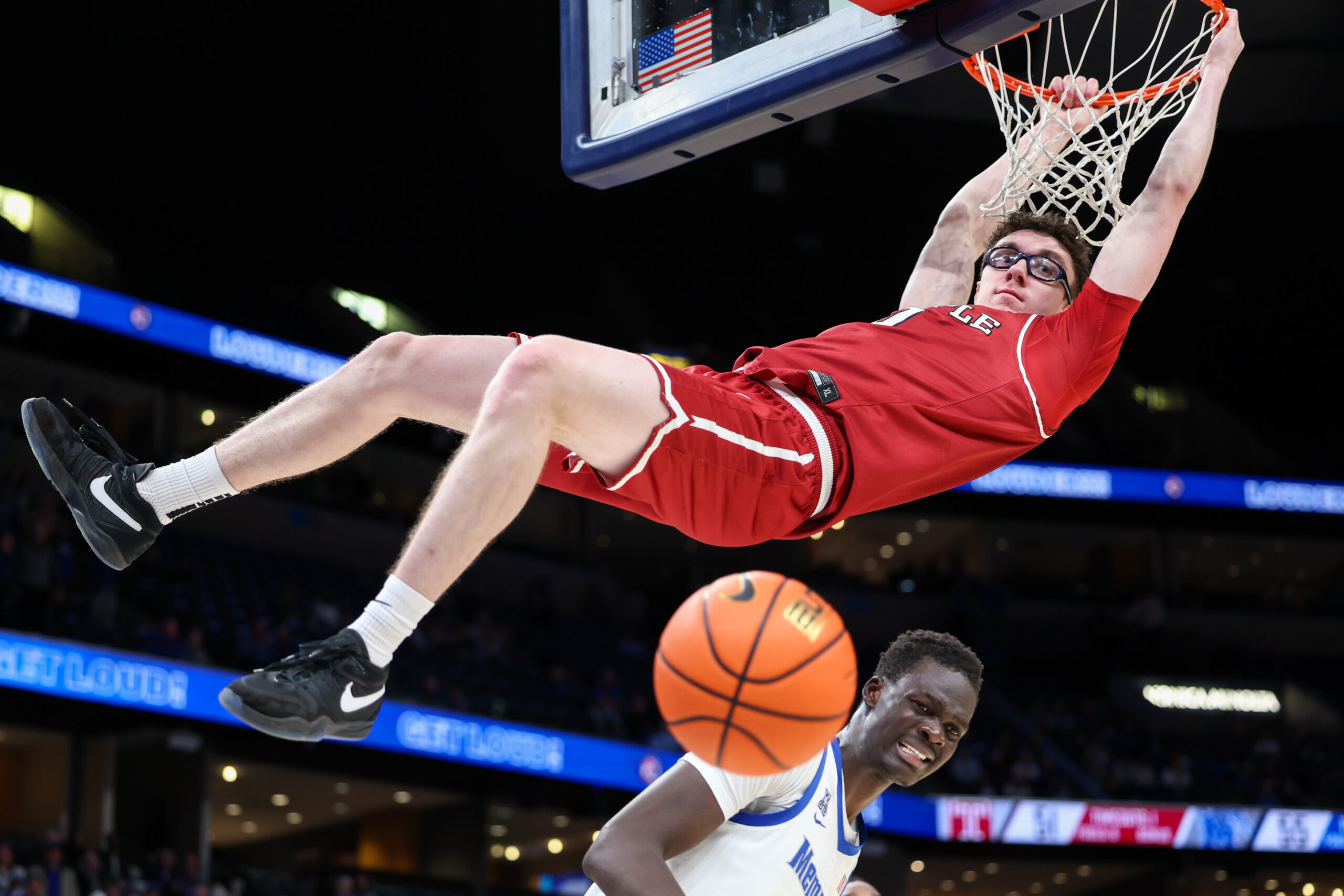 Jan 14, 2026; Memphis, Tennessee, USA; Temple Owls guard Gavin Griffiths (0) dunks the ball against the Memphis Tigers during the second half at FedExForum. Mandatory Credit: Wesley Hale-Imagn Images