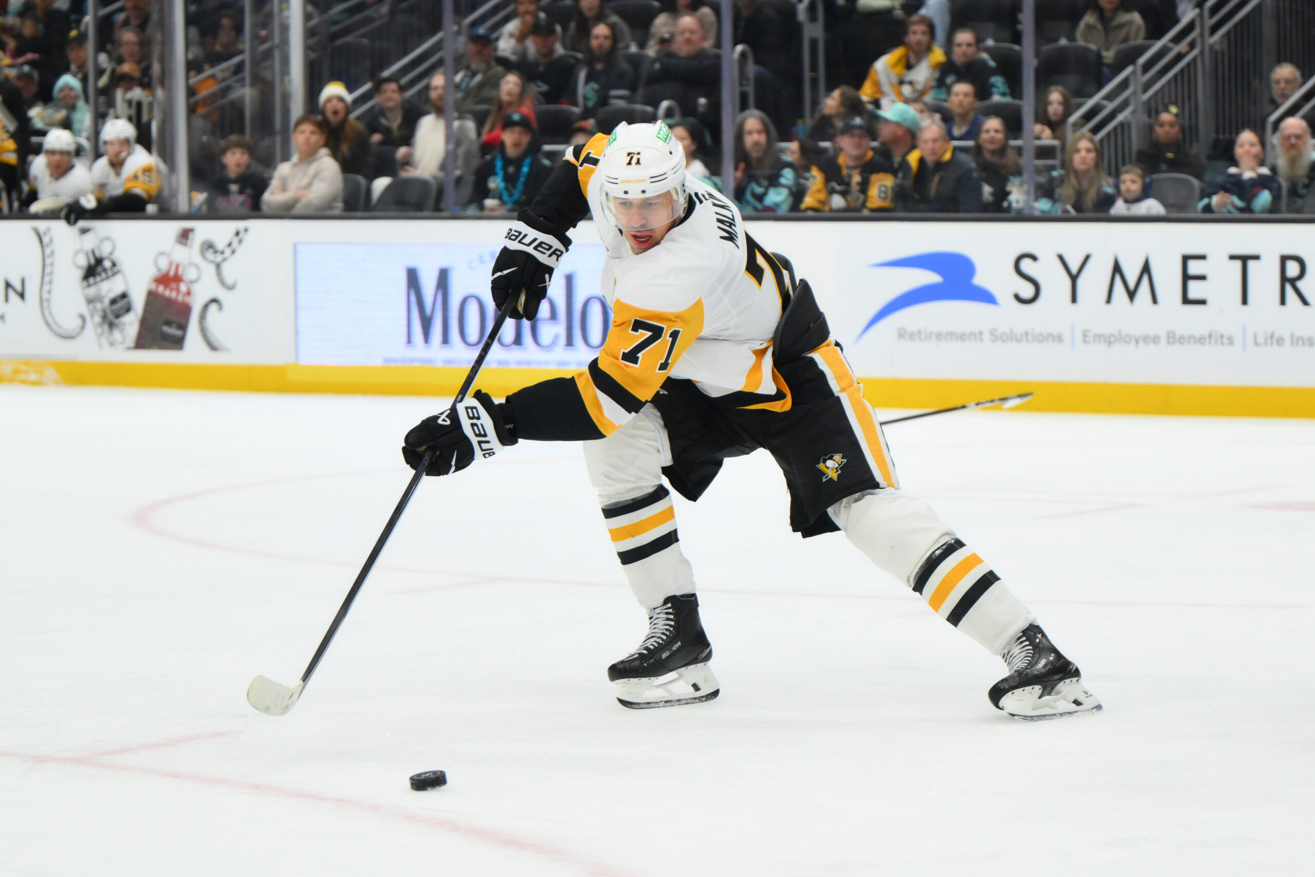 Jan 19, 2026; Seattle, Washington, USA; Pittsburgh Penguins center Evgeni Malkin (71) passes the puck against the Seattle Kraken during the second period at Climate Pledge Arena. Mandatory Credit: Steven Bisig-Imagn Images