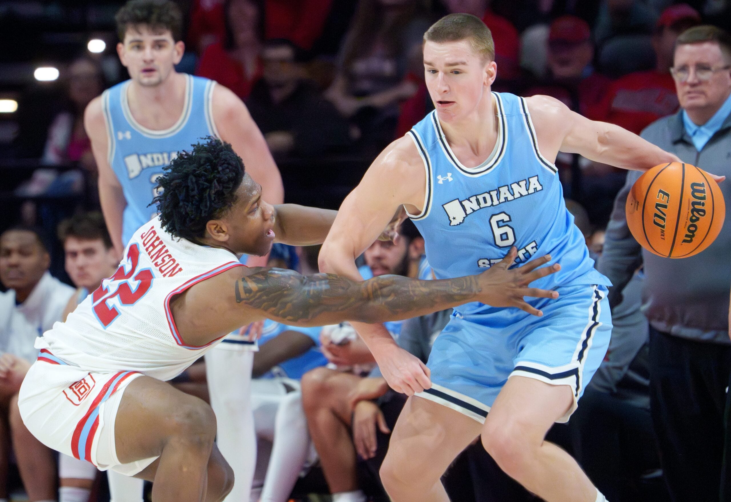 Bradley’s Jaquon Johnson, left, pressures Indiana State’s Jo Van Buggenhout in the second half of their college basketball game Wednesday, Jan. 21, 2026 at Carver Arena. The Braves mounted a last-minute rally to defeat the Sycamores 75-68.