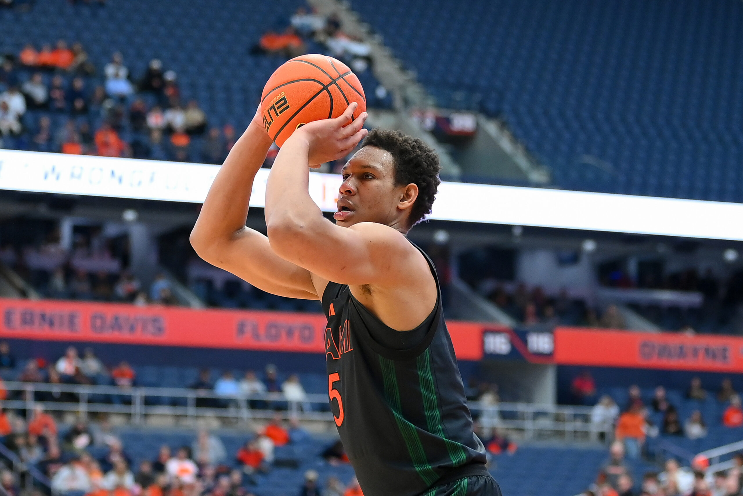 Jan 24, 2026; Syracuse, New York, USA; Miami Hurricanes forward Malik Reneau (5) shoots during the first half against the Syracuse Orange at the JMA Wireless Dome. Mandatory Credit: Rich Barnes-Imagn Images