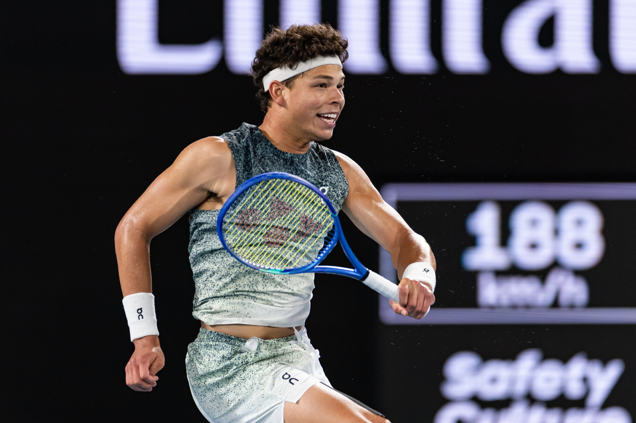 Jan 28, 2026; Melbourne, Victoria, Australia; Ben Shelton of United States in action against Jannik Sinner of Italy in the quarterfinals of the menís singles at the Australian Open at Rod Laver Arena in Melbourne Park. Mandatory Credit: Mike Frey-Imagn Images