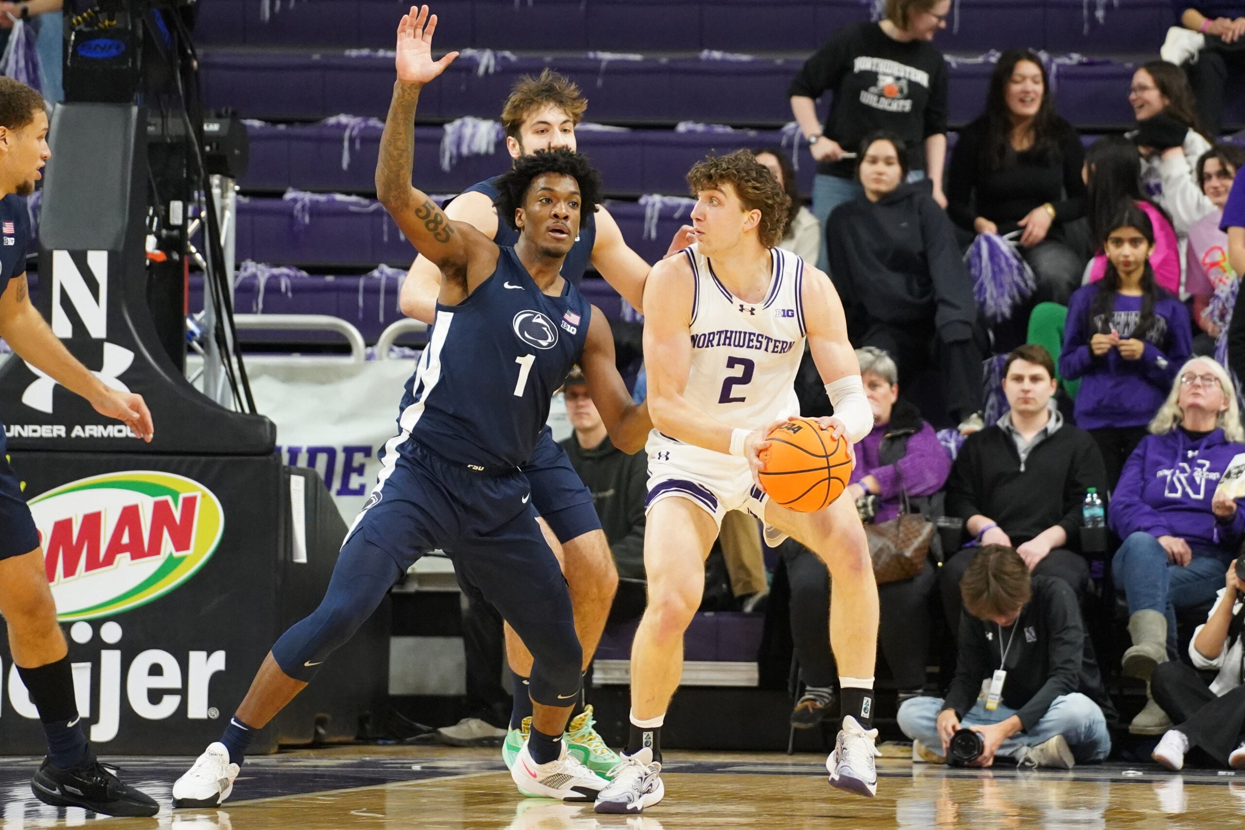 Jan 29, 2026; Evanston, Illinois, USA; Penn State Nittany Lions forward Mason Blackwood (1) defends Northwestern Wildcats forward Nick Martinelli (2) during the first half at Welsh-Ryan Arena. Mandatory Credit: David Banks-Imagn Images