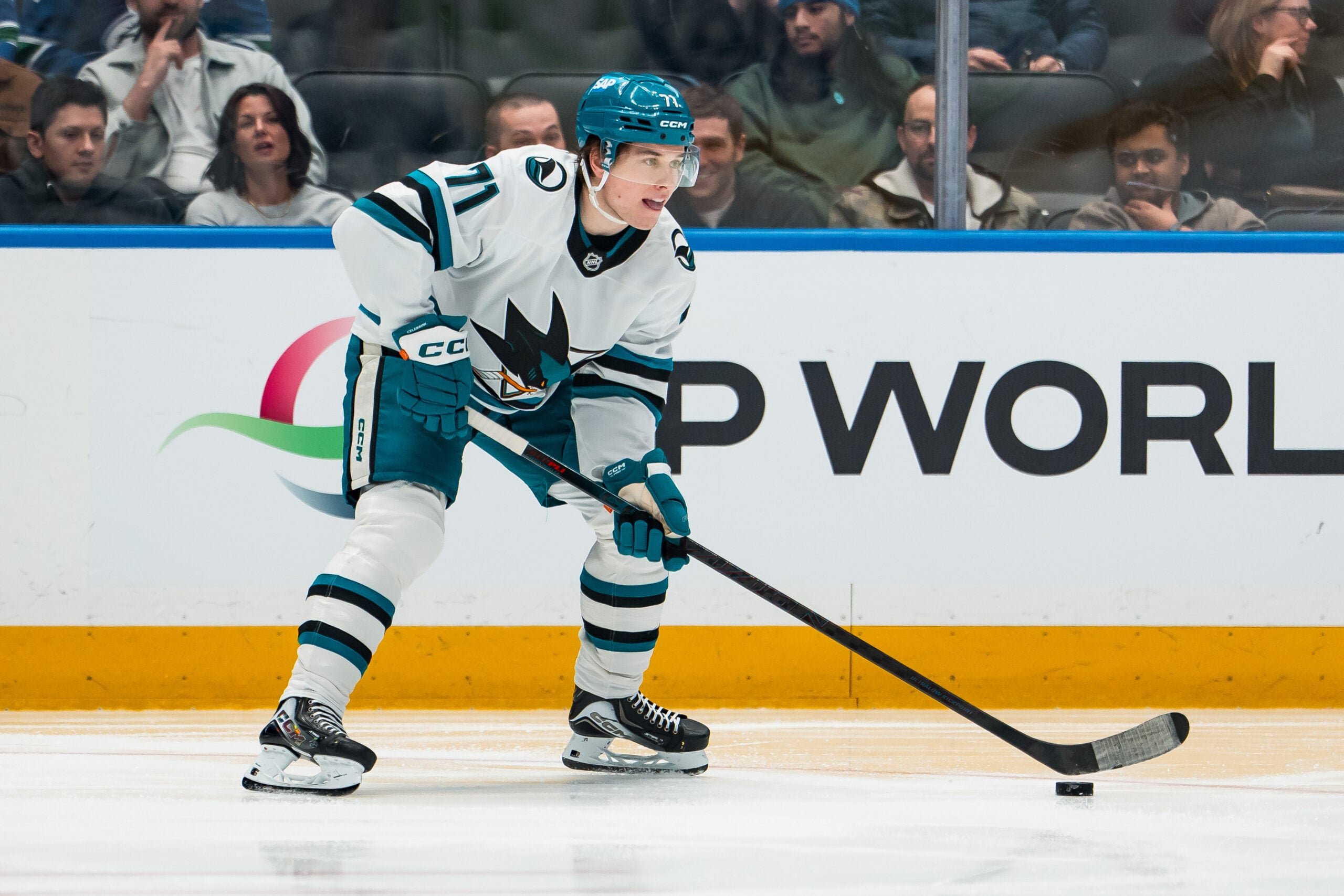 Jan 27, 2026; Vancouver, British Columbia, CAN; San Jose Sharks forward Macklin Celebrini (71) handles the puck against the Vancouver Canucks in the third period at Rogers Arena. Mandatory Credit: Bob Frid-Imagn Images