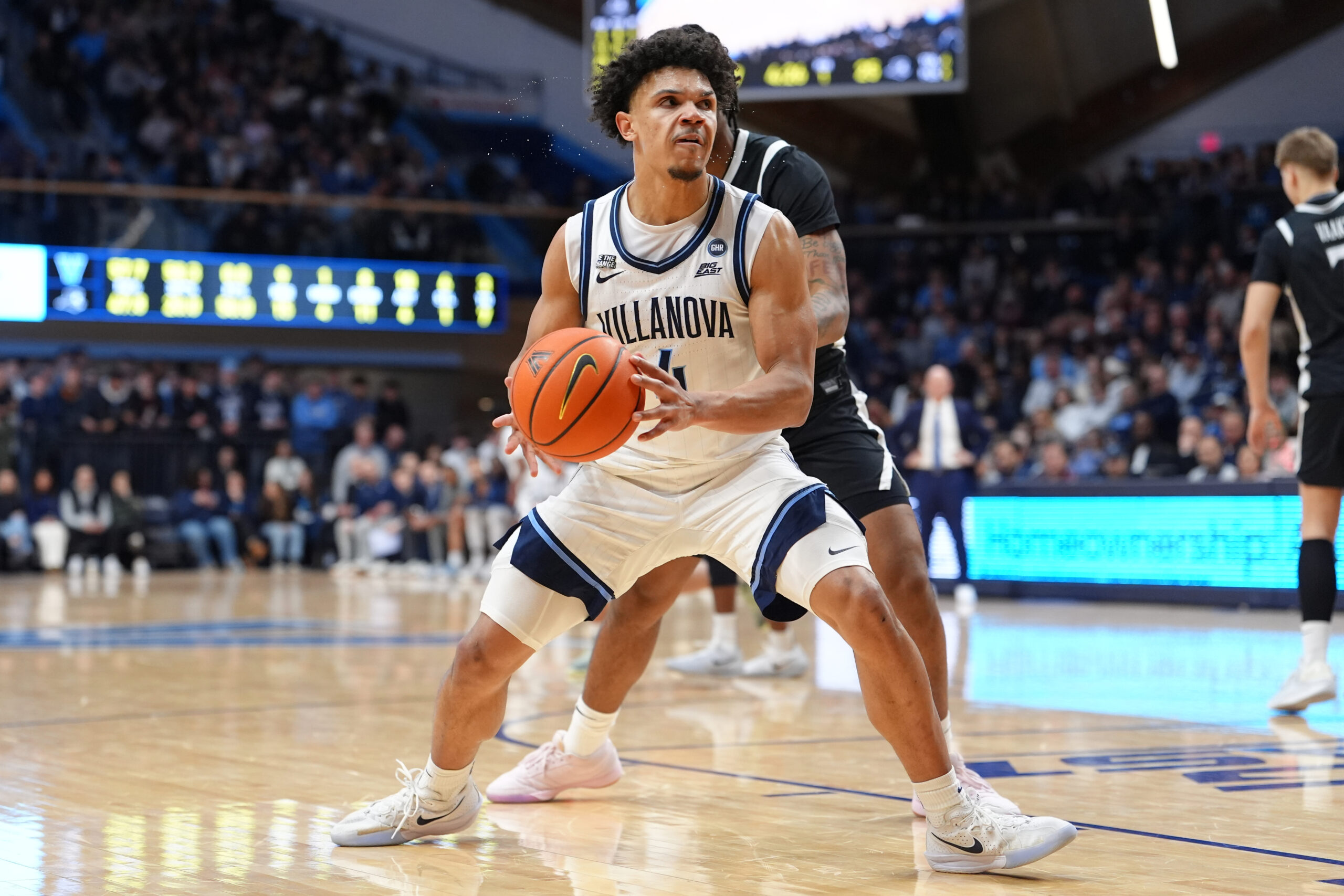 Jan 30, 2026; Villanova, Pennsylvania, USA; Villanova Wildcats guard Tyler Perkins (4) drives with the ball against the Providence Friars in the first half at William B. Finneran Pavilion. Mandatory Credit: Kyle Ross-Imagn Images