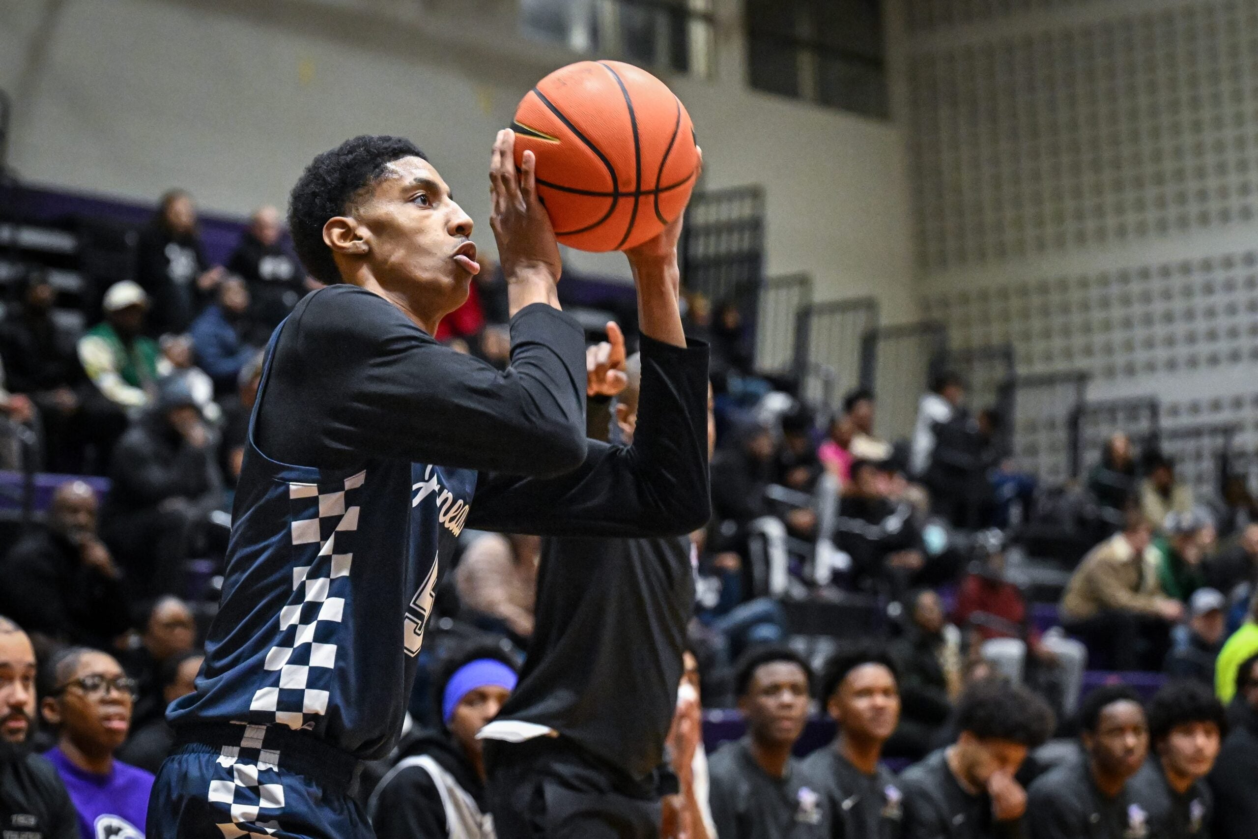 Milwaukee Juneau forward Corey Collins (5) takes a 3-point shot against Milwaukee Bradley Tech in a game Friday, January 30, 2026, at Bradley Tech High School in Milwaukee, Wisconsin.