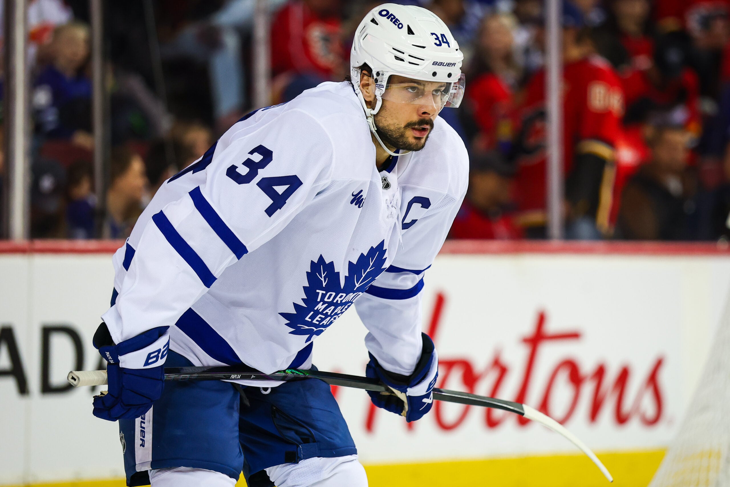 Feb 2, 2026; Calgary, Alberta, CAN; Toronto Maple Leafs center Auston Matthews (34) against the Calgary Flames during the second period at Scotiabank Saddledome. Mandatory Credit: Sergei Belski-Imagn Images