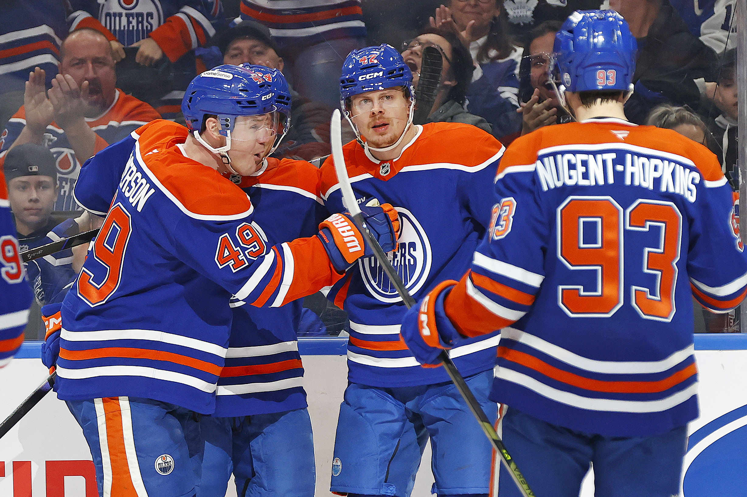 Feb 3, 2026; Edmonton, Alberta, CAN; The Edmonton Oilers celebrate a goal scored by forward Kasperi Kapanen (42) during the third period against the Toronto Maple Leafs at Rogers Place. Mandatory Credit: Perry Nelson-Imagn Images