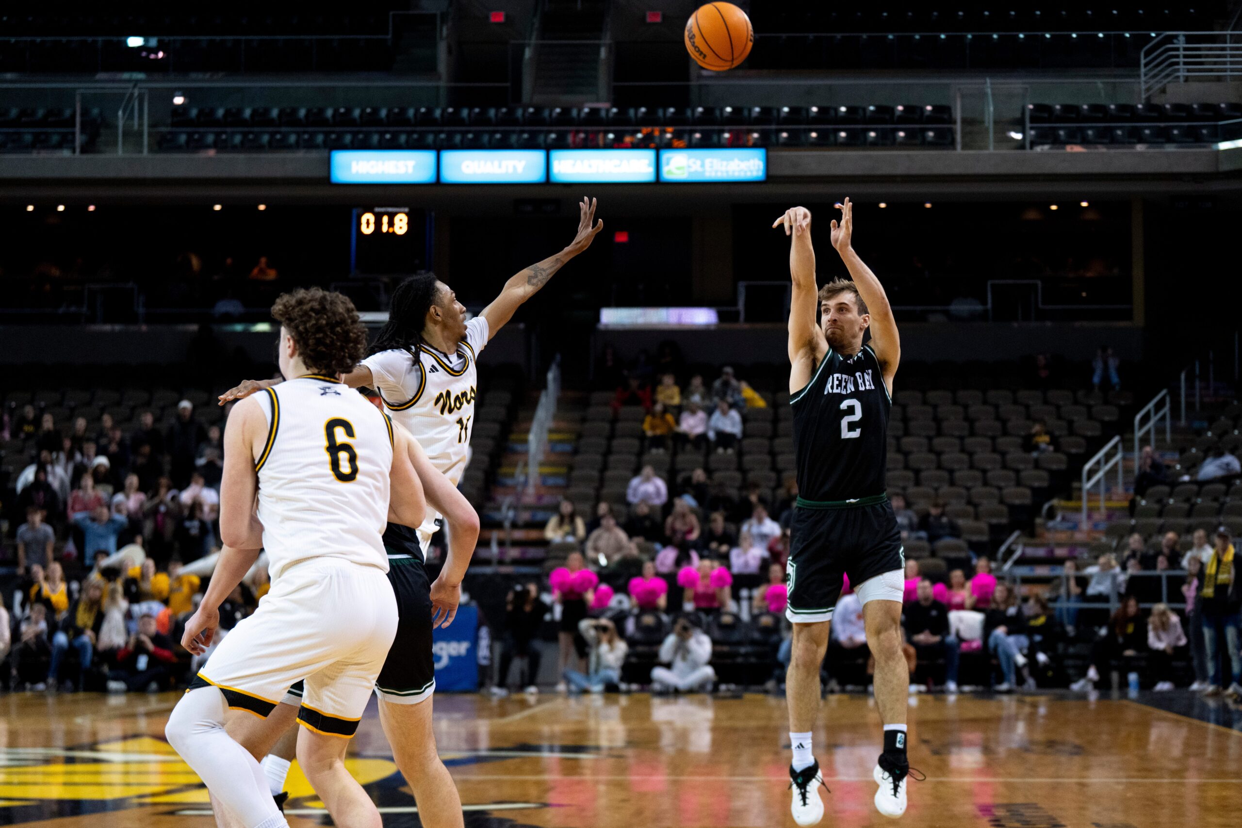 Green Bay Phoenix guard Preston Ruedinger (2) hits a game winning 3-point basket over Green Bay Phoenix guard Trey Schachter (11) in overtime of the NCAA basketball game at Truist Arena in Highland Heights, Ky., on Wednesday, Feb. 4, 2026.
