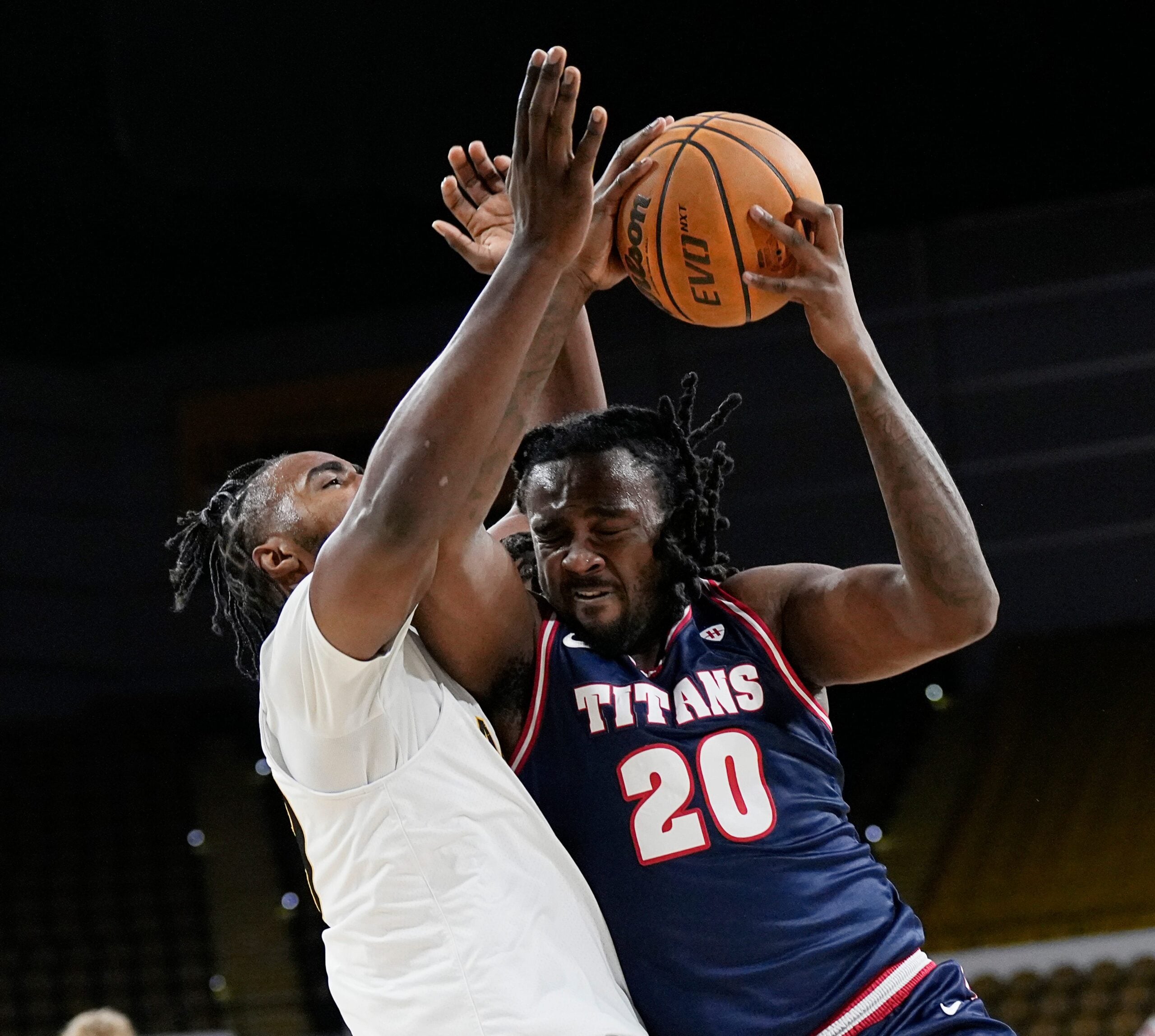 Milwaukee Panthers guard Aaron Franklin (29) attempts to block Detroit Mercy Titans forward London Maiden (20) during the first half of the game on Wednesday February 4, 2026 at the UW-Milwaukee Panther Arena in Milwaukee, Wisconsin.
