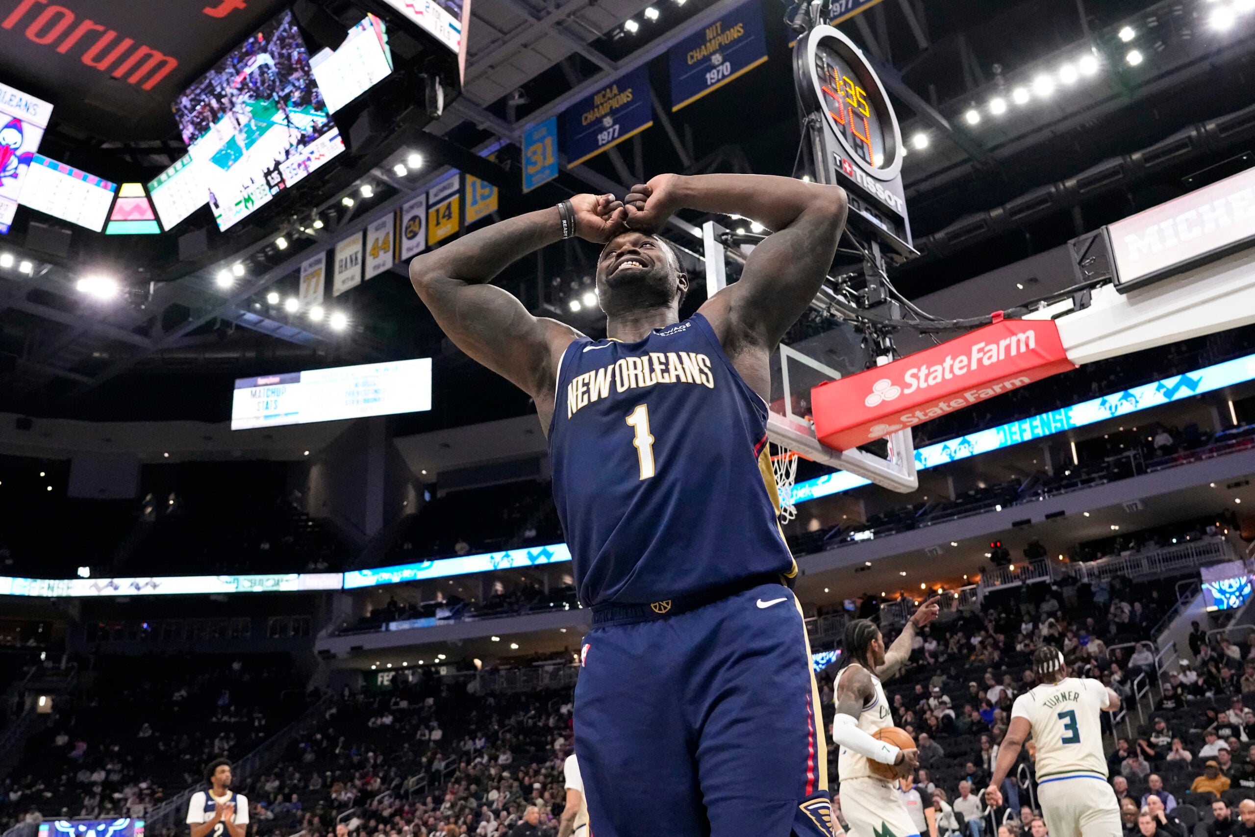 Feb 4, 2026; Milwaukee, Wisconsin, USA;  New Orleans Pelicans forward Zion Williamson (1) reacts to a call during overtime against the Milwaukee Bucks at Fiserv Forum. Mandatory Credit: Jeff Hanisch-Imagn Images
