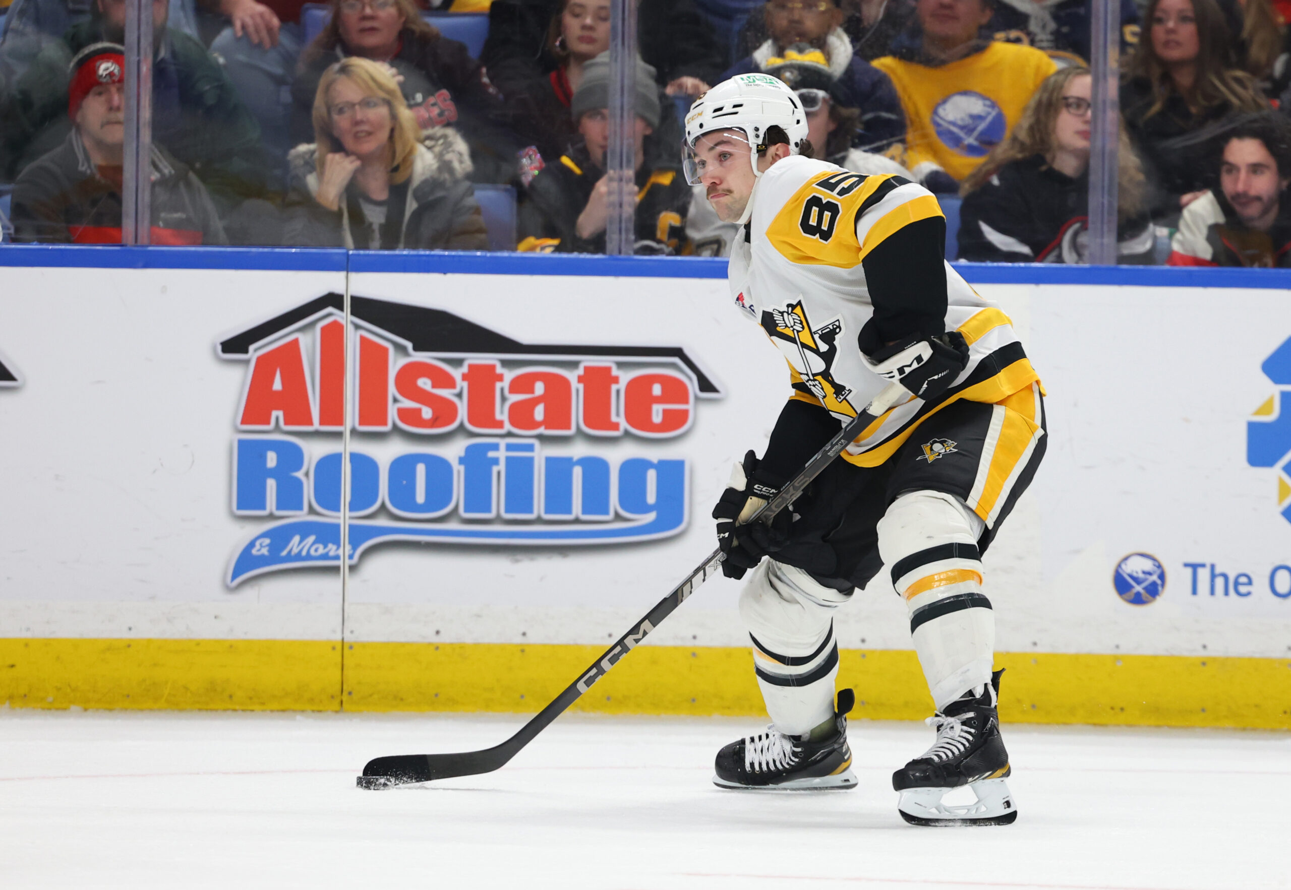 Feb 5, 2026; Buffalo, New York, USA; Pittsburgh Penguins right wing Avery Hayes (85) looks to make a pass during the third period against the Buffalo Sabres at KeyBank Center. Mandatory Credit: Timothy T. Ludwig-Imagn Images
