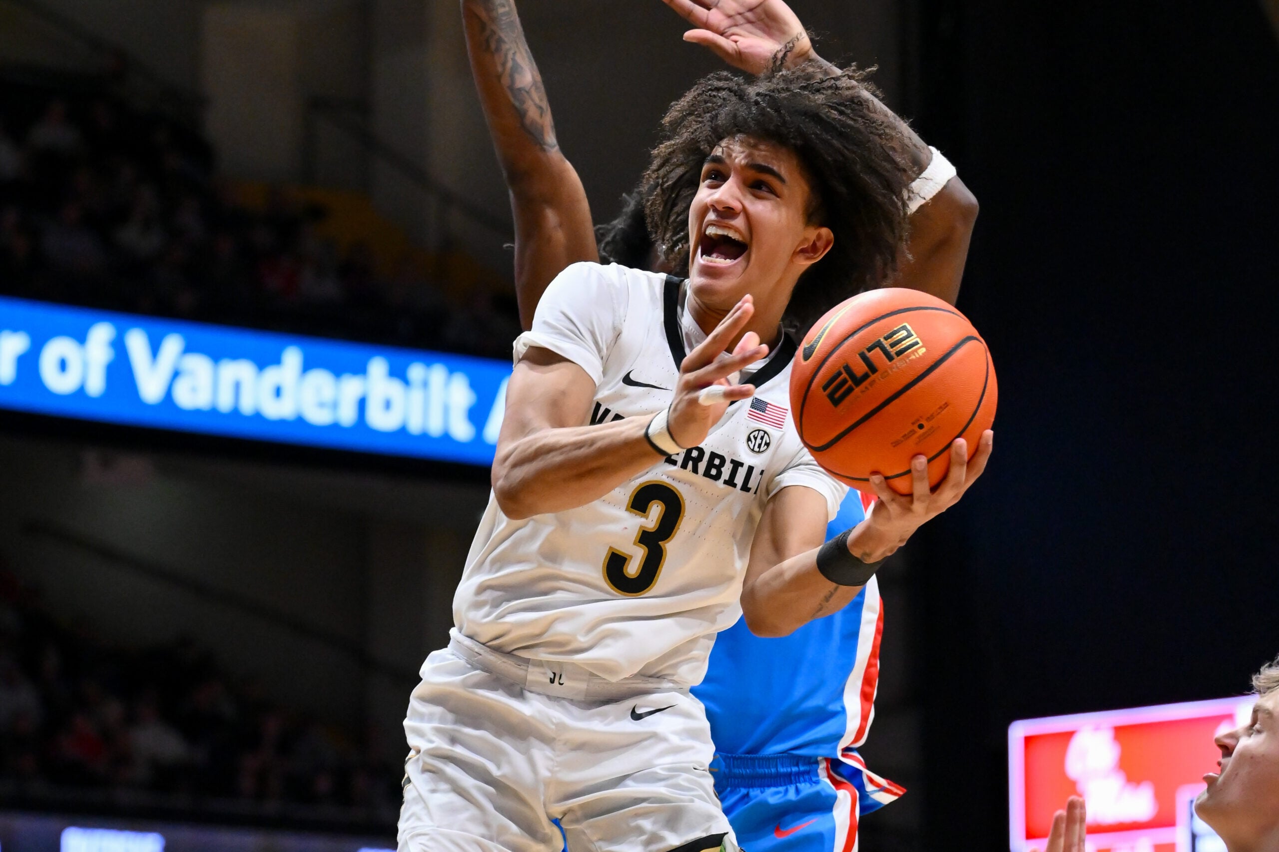 Jan 31, 2026; Nashville, TN, USA;  Vanderbilt Commodores guard Tyler Tanner (3) shoots the ball over Mississippi Rebels guard AJ Storr (2) during the second half at Memorial Gymnasium. Mandatory Credit: Steve Roberts-Imagn Images