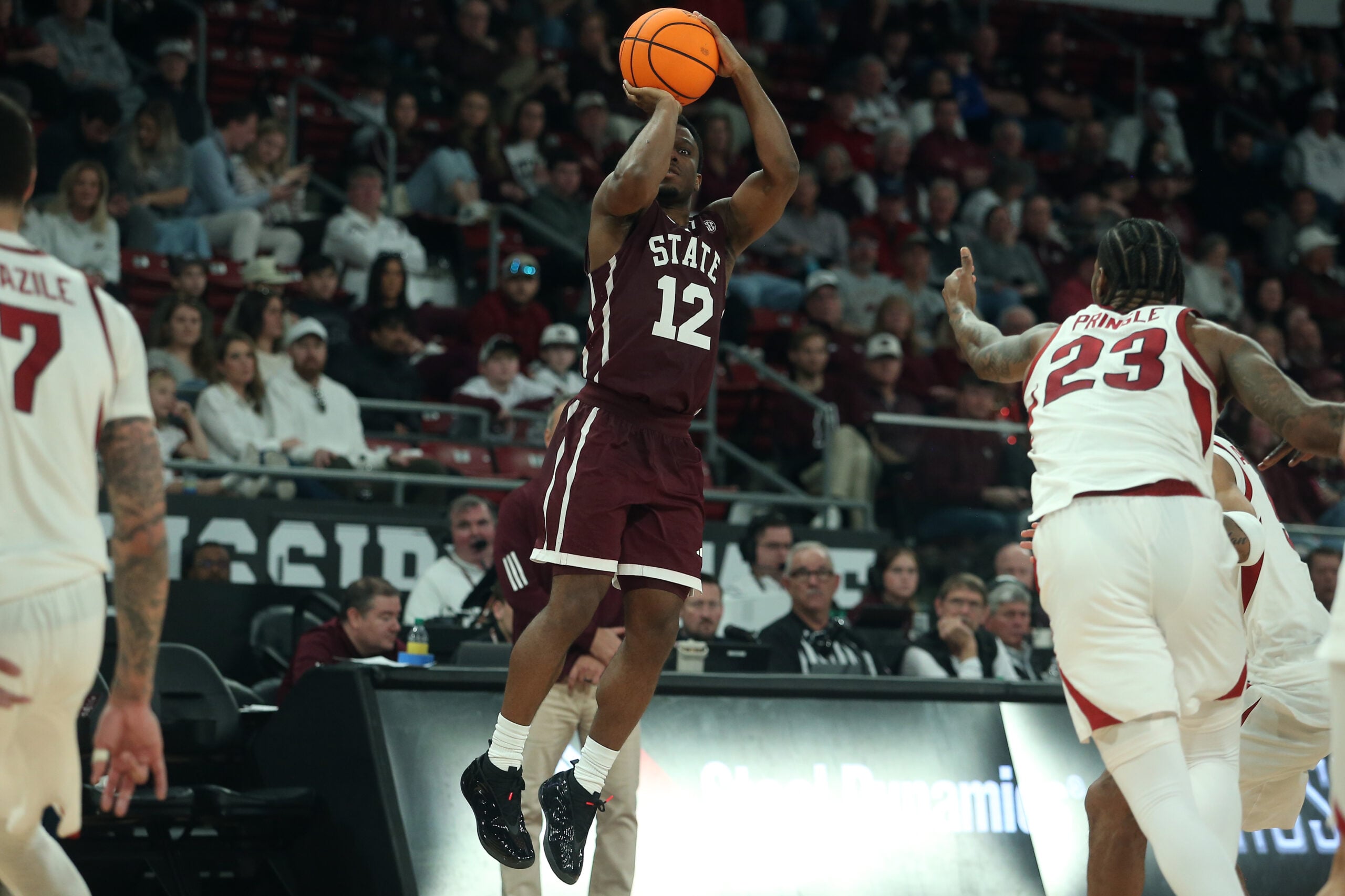Feb 7, 2026; Starkville, Mississippi, USA; Mississippi State Bulldogs guard Josh Hubbard (12) shoots for three during the second half against the Arkansas Razorbacks at Humphrey Coliseum. Mandatory Credit: Petre Thomas-Imagn Images