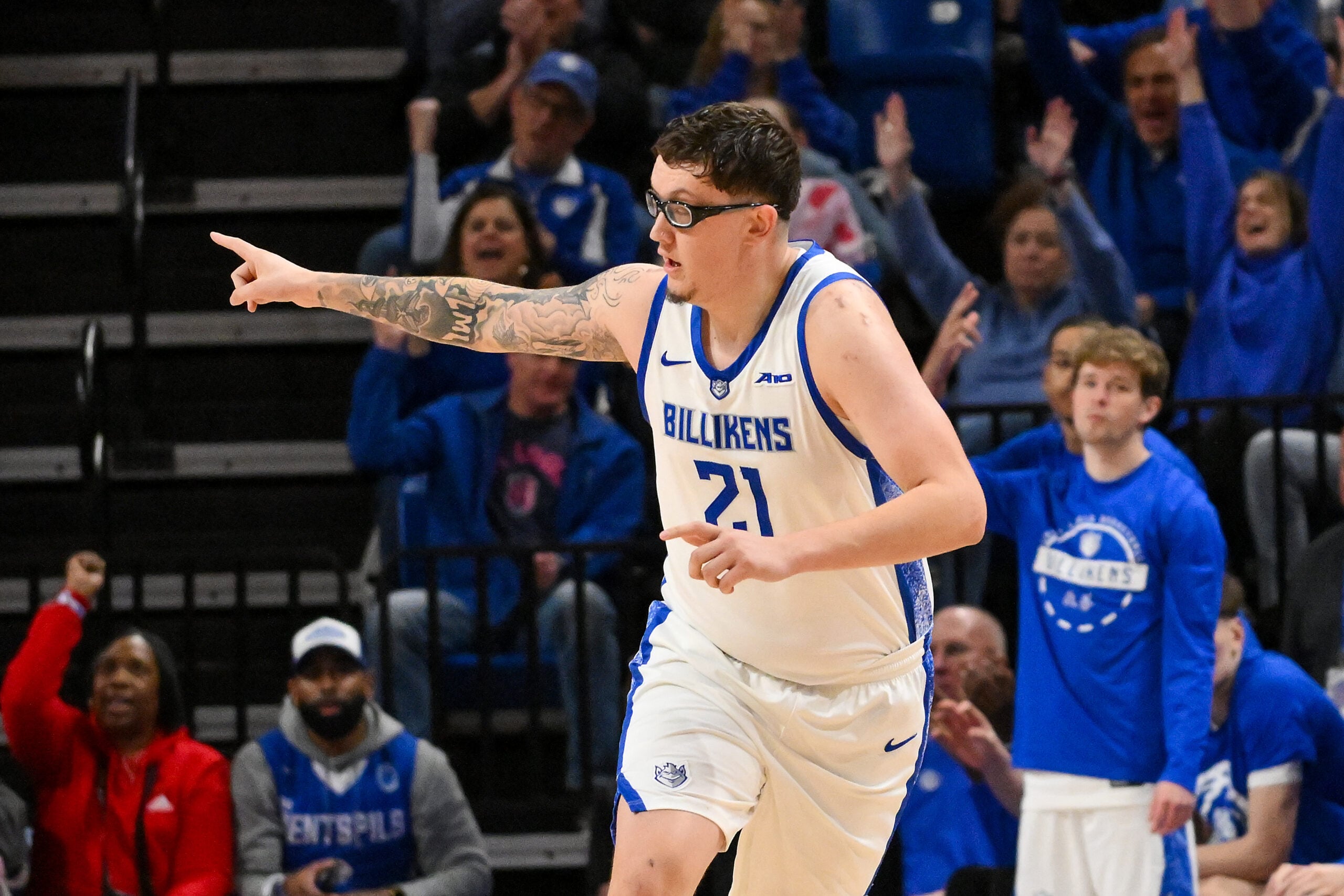 Feb 7, 2026; St. Louis, Missouri, USA; Saint Louis Billikens center Robbie Avila (21) reacts after making a three point shot against the La Salle Explorers during the second half at Chaifetz Arena. Mandatory Credit: Jeff Curry-Imagn Images