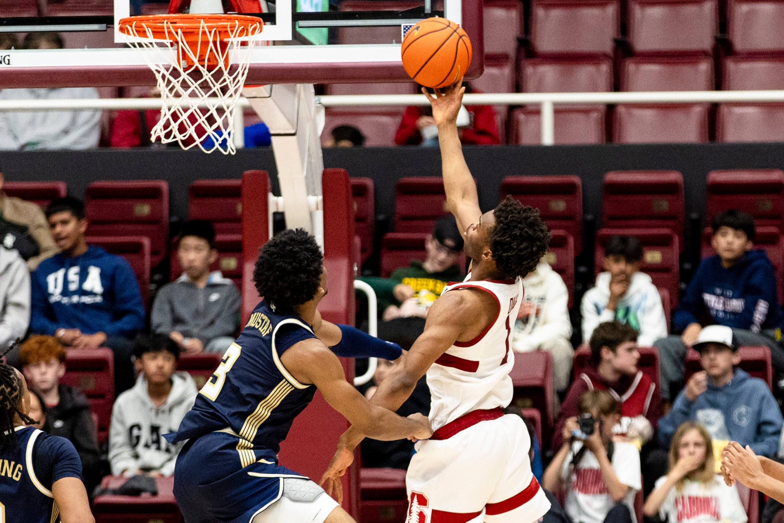 Feb 7, 2026; Stanford, California, USA; Stanford Cardinal guard Ebuka Okorie (1) shoots as Georgia Tech Yellow Jackets guard Jaeden Mustaf (3) defends during the second half at Maples Pavilion. Mandatory Credit: John Hefti-Imagn Images