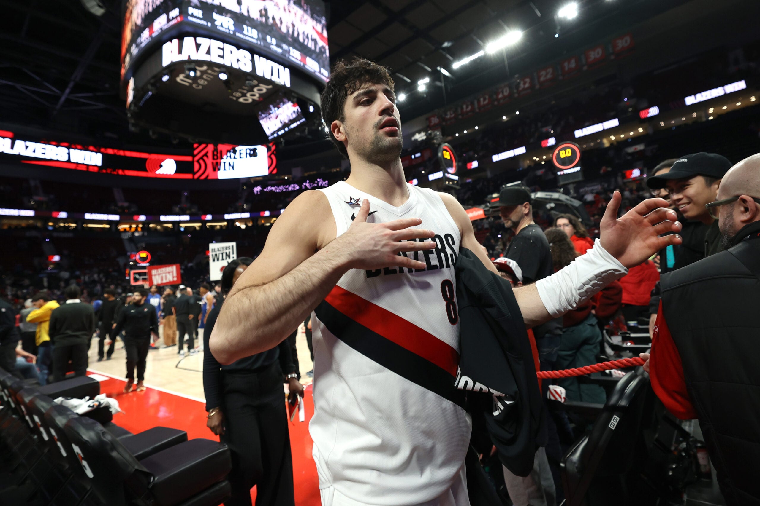 Feb 9, 2026; Portland, Oregon, USA;  Portland Trail Blazers forward Deni Avdija (8) heads to the locker room after the Trail Blazers defeat 76ers 135-118 during the second half at Moda Center. Mandatory Credit: Jaime Valdez-Imagn Images