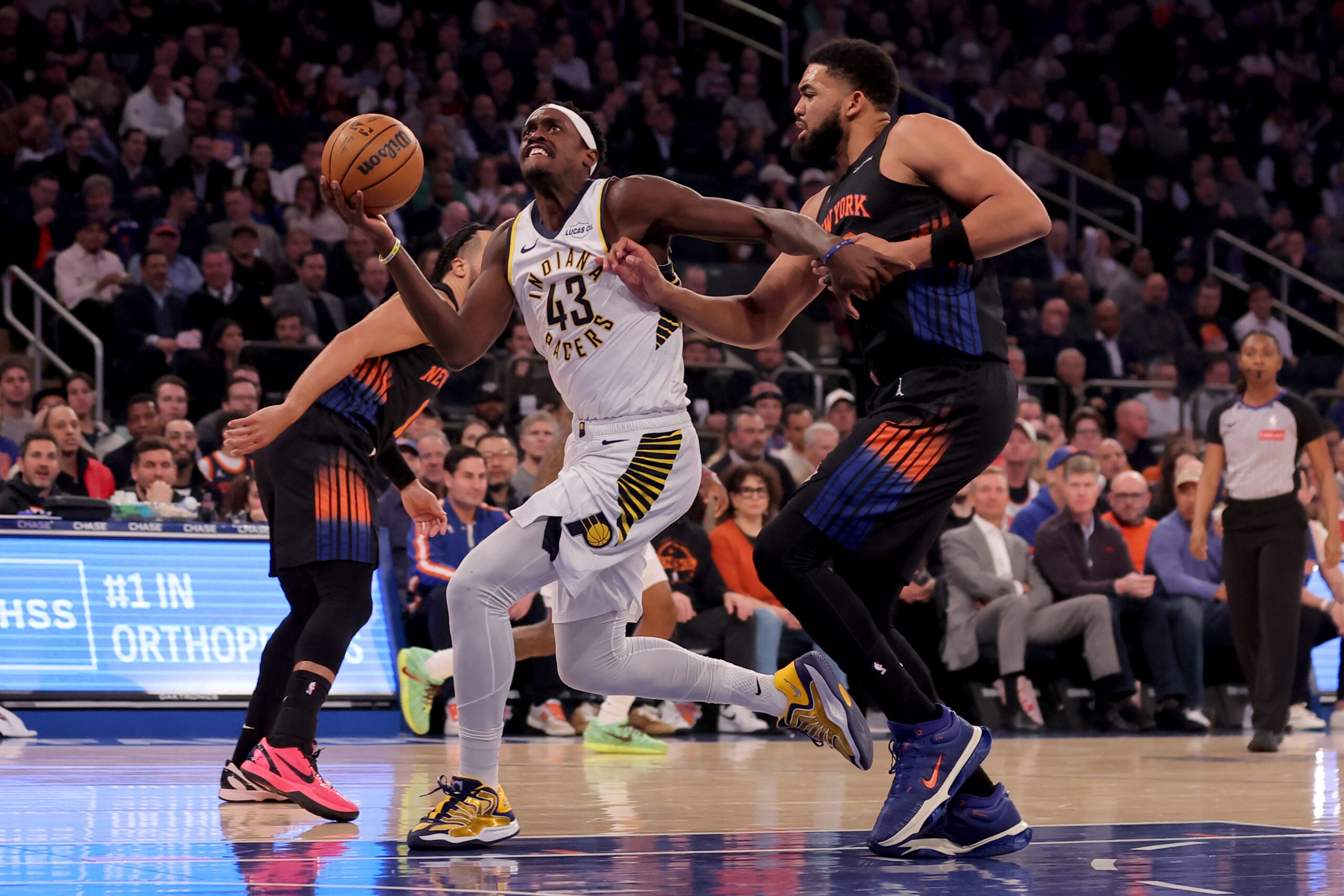 Feb 10, 2026; New York, New York, USA; Indiana Pacers forward Pascal Siakam (43) drives to the basket against New York Knicks center Karl-Anthony Towns (32) and guard Jalen Brunson (11) during the first quarter at Madison Square Garden. Mandatory Credit: Brad Penner-Imagn Images