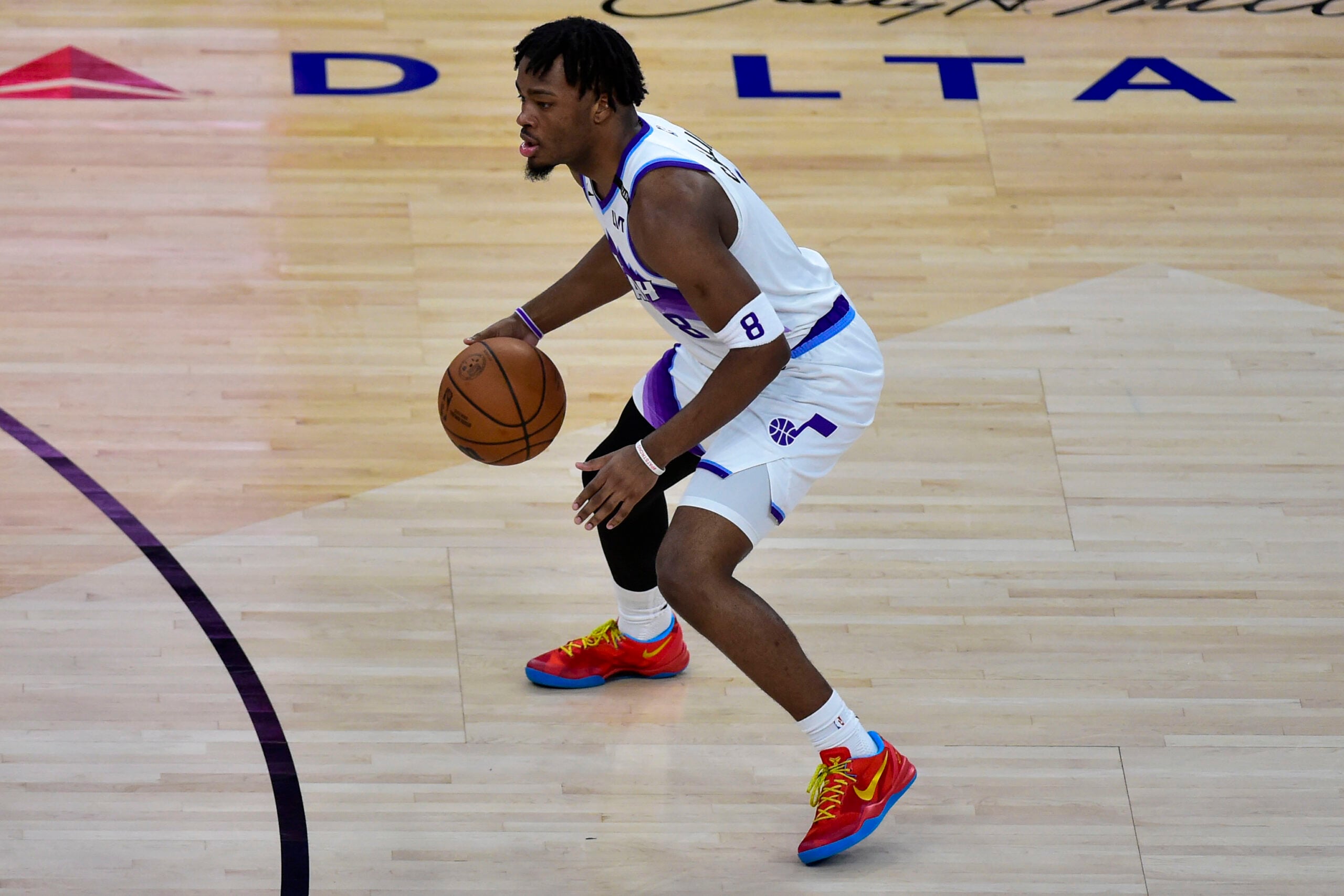 Feb 11, 2026; Salt Lake City, Utah, USA; Utah Jazz guard Isaiah Collier (8) plans his next move during the first half against the Sacramento Kings at Delta Center. Mandatory Credit: Peter Creveling-Imagn Images