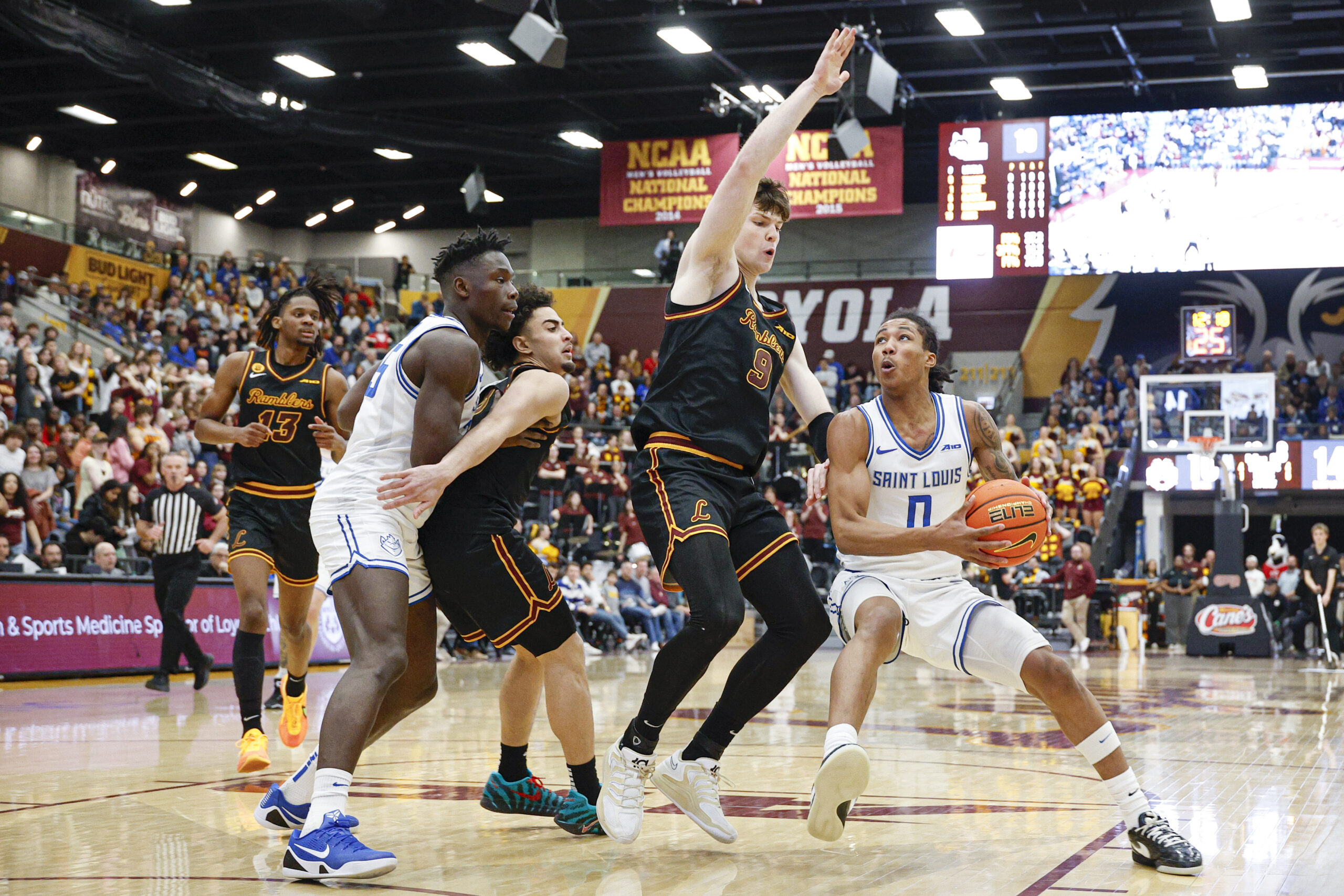 Feb 13, 2026; Chicago, Illinois, USA; Saint Louis Billikens guard Kellen Thames (0) drives to the basket against the Loyola Chicago Ramblers during the first half at Joseph J. Gentile Arena. Mandatory Credit: Kamil Krzaczynski-Imagn Images