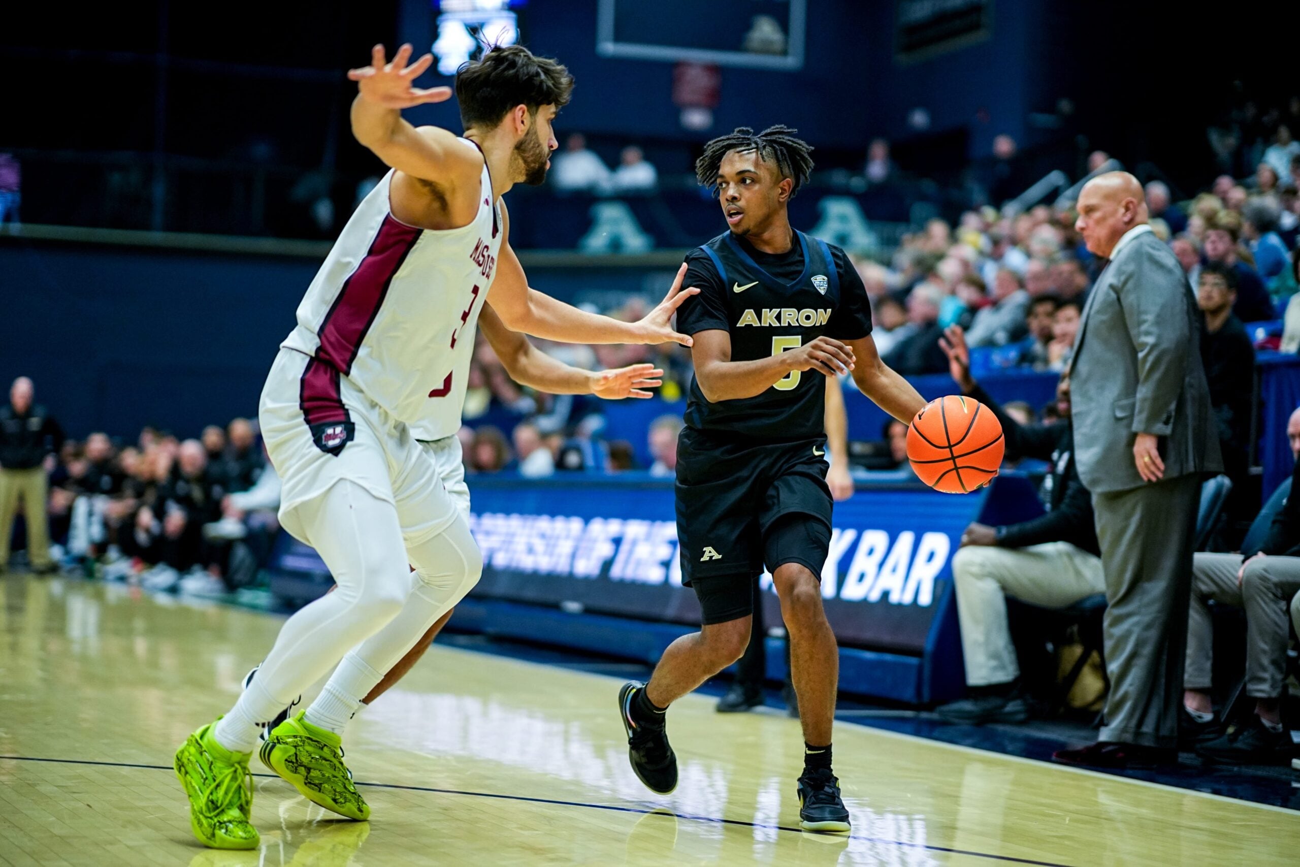 Akron Zips’ Tavari Johnson (5) looks to pass against UMass, Feb. 13, 2026, at James A Rhodes Arena in Akron, Ohio.