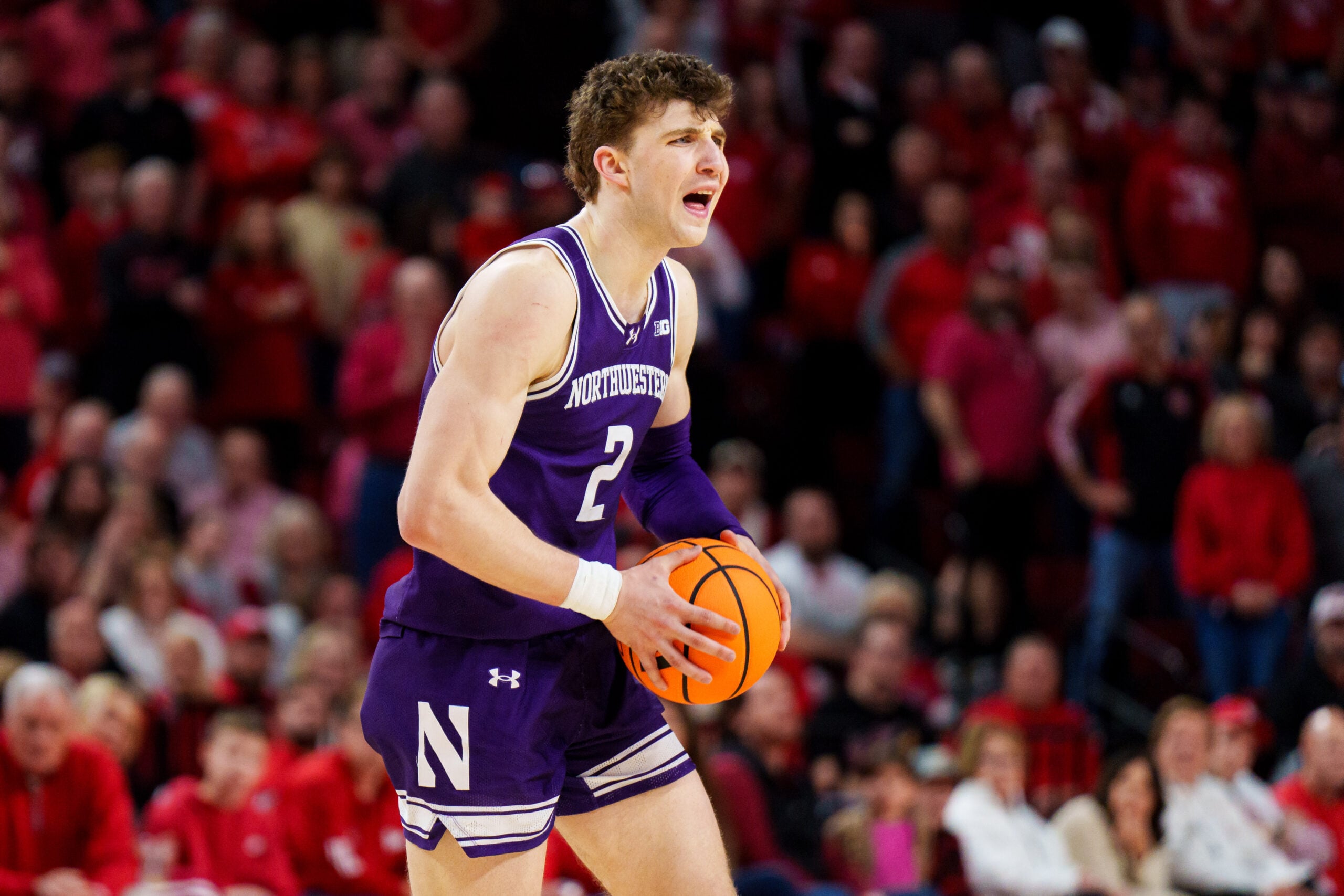 Feb 14, 2026; Lincoln, Nebraska, USA; Northwestern Wildcats forward Nick Martinelli (2) looks to pass during the second half against the Nebraska Cornhuskers at Pinnacle Bank Arena. Mandatory Credit: Dylan Widger-Imagn Images