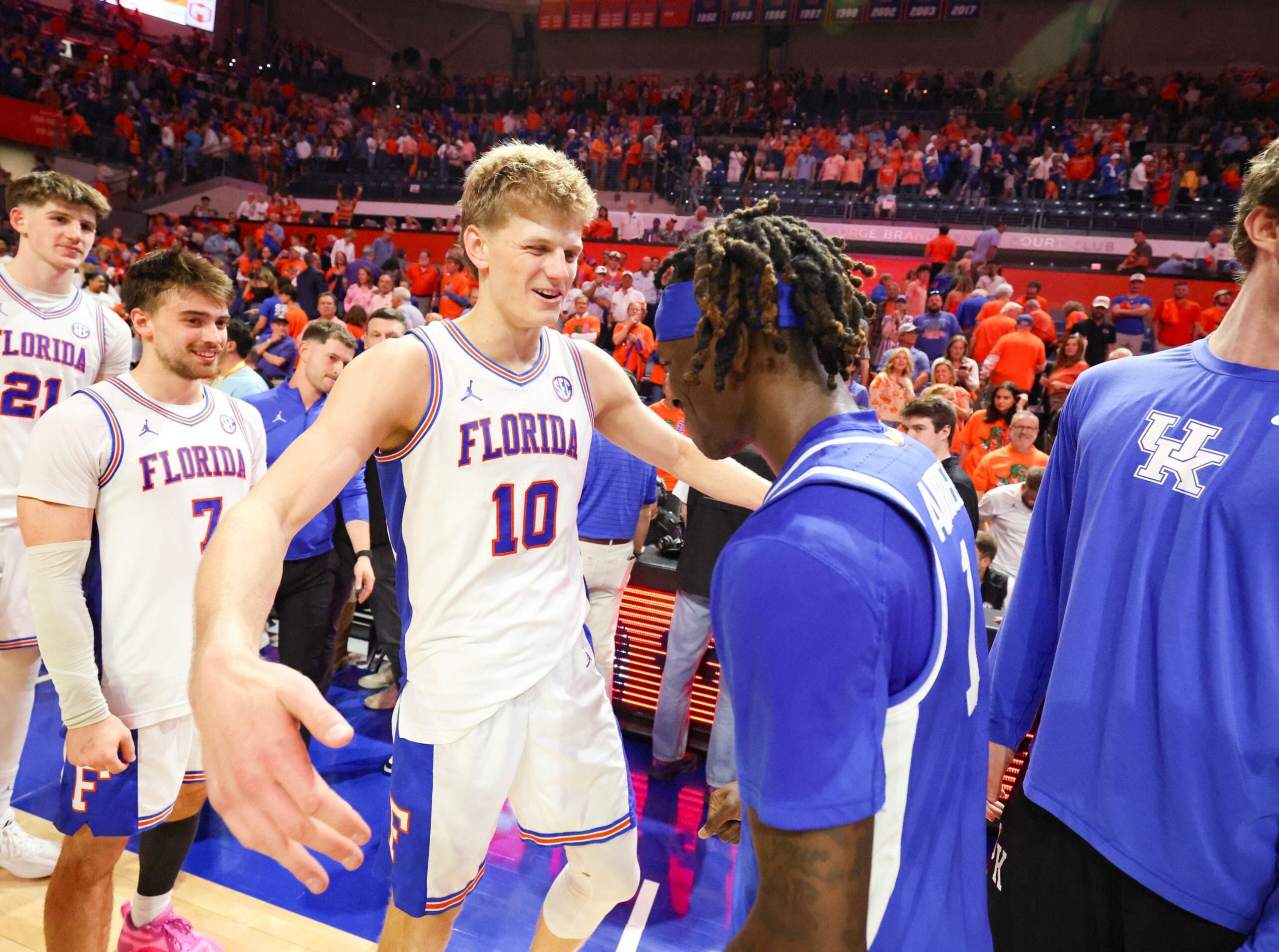 Florida forward Thomas Haugh (10) greats former Gator Kentucky guard Denzel Aberdeen (1) after a NCAA mens basketball game at Steven C. O'Connell Center Exactek arena in Gainesville, FL on Saturday, February 14, 2026. [Alan Youngblood/Gainesville Sun]