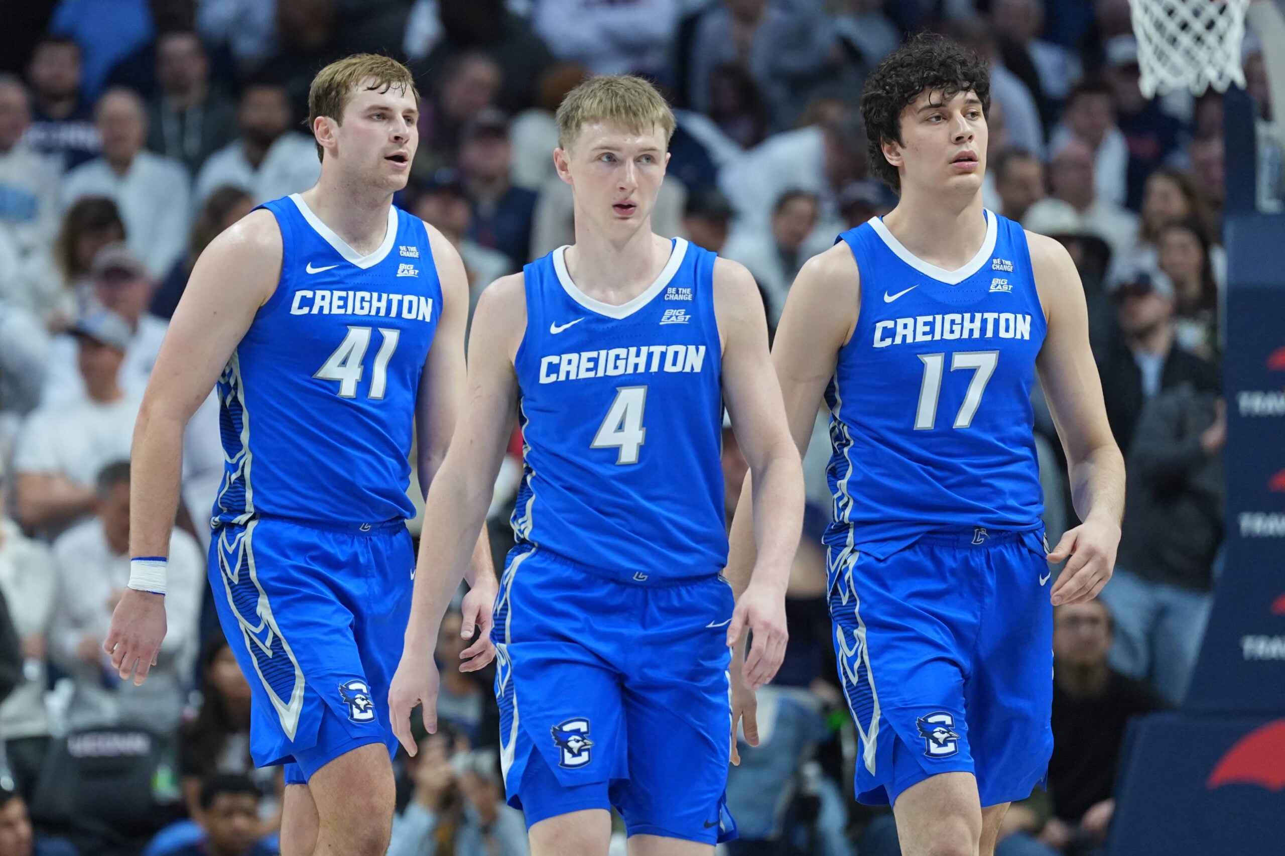 Feb 18, 2026; Storrs, Connecticut, USA; Creighton Bluejays guard Josh Dix (4), forward Isaac Traudt (41) and forward Kerem Konan (17) make their way top the bench during a break against the UConn Huskies in the second half at Harry A. Gampel Pavilion. Mandatory Credit: David Butler II-Imagn Images