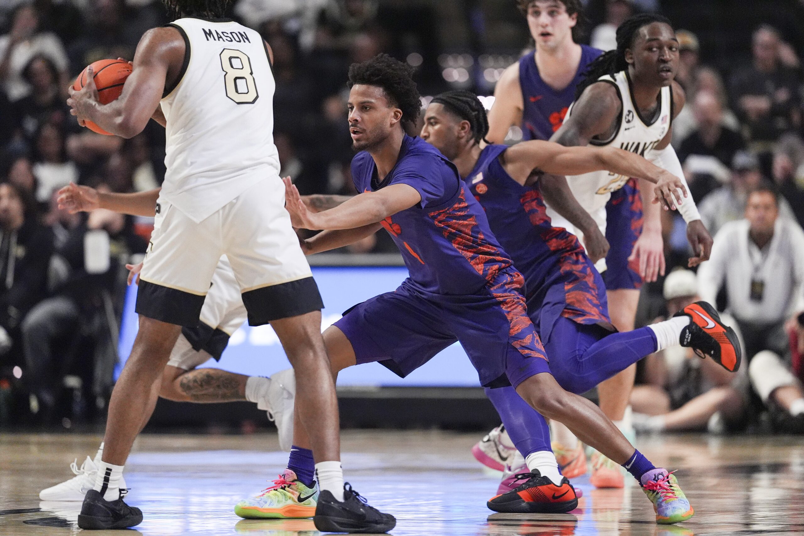 Feb 18, 2026; Winston-Salem, North Carolina, USA; Wake Forest Demon Deacons guard Mekhi Mason (8) handles the ball during the second half at Lawrence Joel Veterans Memorial Coliseum. Mandatory Credit: Jim Dedmon-Imagn Images