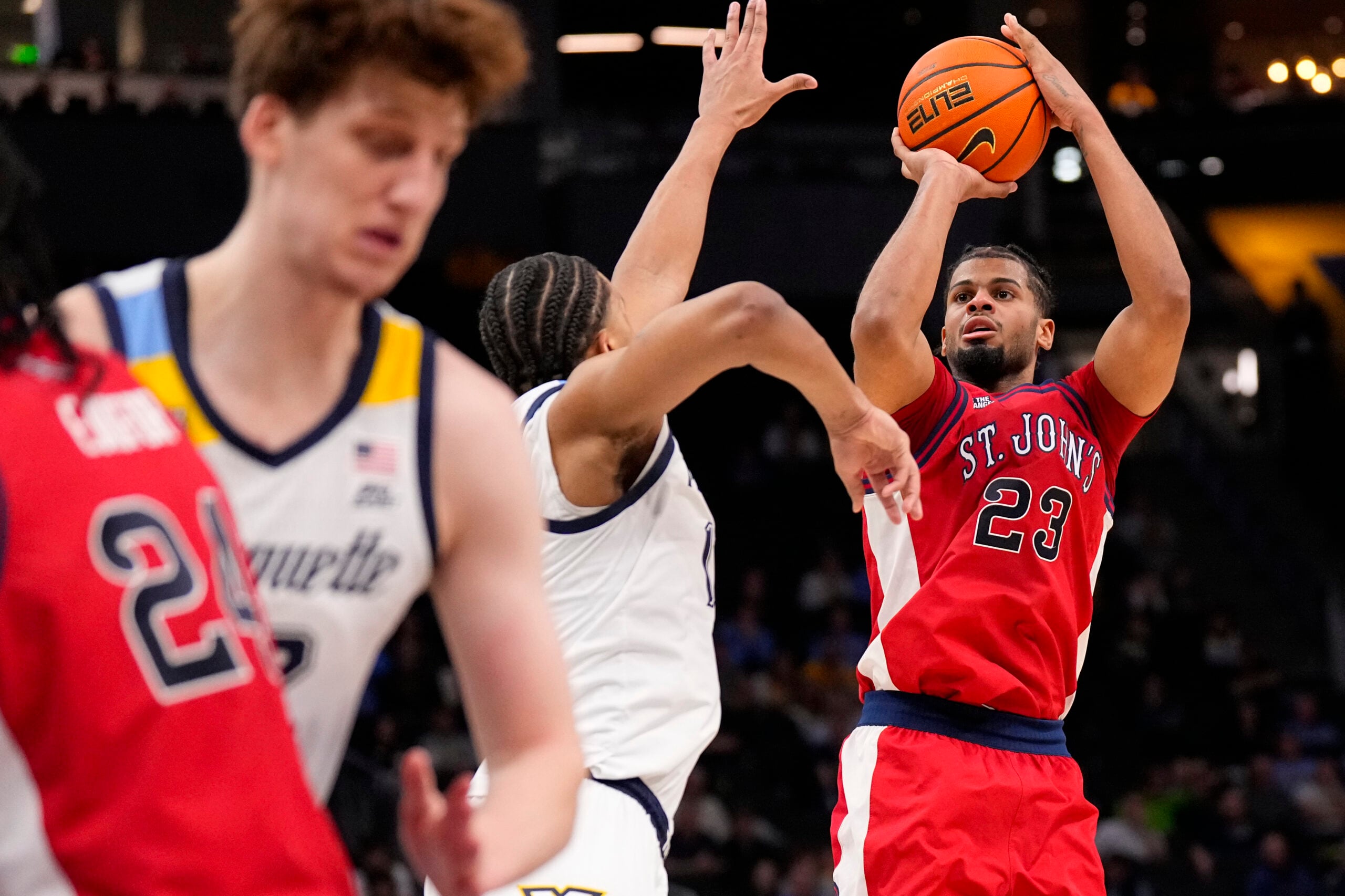 Feb 18, 2026; Milwaukee, Wisconsin, USA;  St. John’s Red Storm guard-forward Bryce Hopkins (23) shoots during the first half against the Marquette Golden Eagles at Fiserv Forum. Mandatory Credit: Jeff Hanisch-Imagn Images