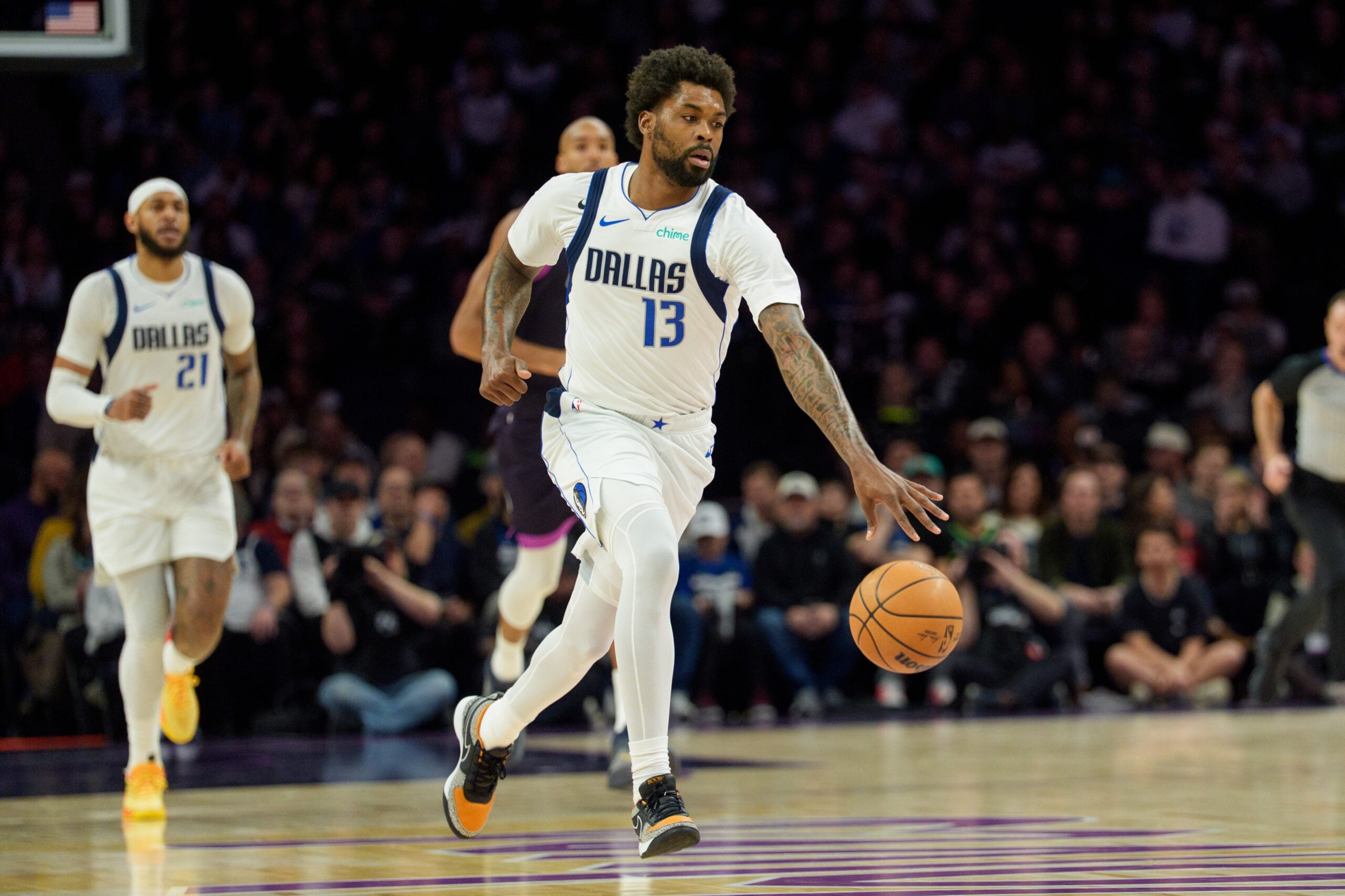 Feb 20, 2026; Minneapolis, Minnesota, USA; Dallas Mavericks forward Naji Marshall (13) dribbles against the Minnesota Timberwolves in the first quarter at Target Center. Mandatory Credit: Matt Blewett-Imagn Images