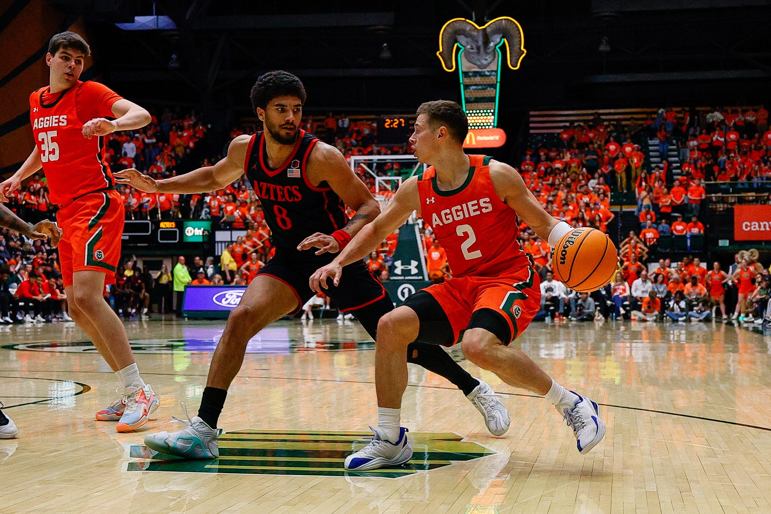 Feb 21, 2026; Fort Collins, Colorado, USA; Colorado State Rams guard Brandon Rechsteiner (2) controls the ball as San Diego State Aztecs forward Tae Simmons (8) guards in the second half at Moby Arena. Mandatory Credit: Isaiah J. Downing-Imagn Images