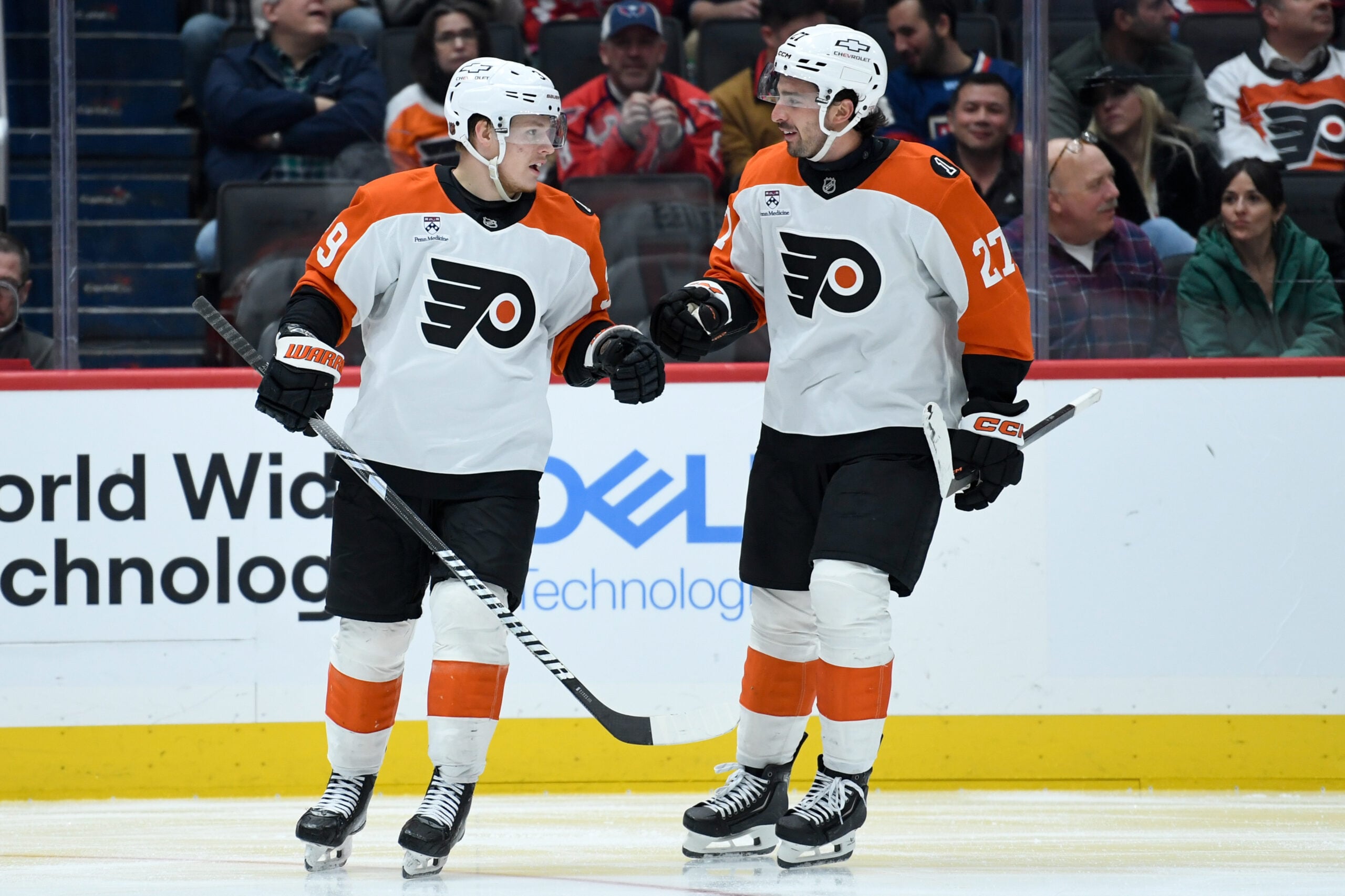 Feb 25, 2026; Washington, District of Columbia, USA; Philadelphia Flyers right wing Matvei Michkov (39) celebrates with left wing Noah Cates (27) after scoring a goal against the Washington Capitals during the third period at Capital One Arena. Mandatory Credit: Hannah Foslien-Imagn Images