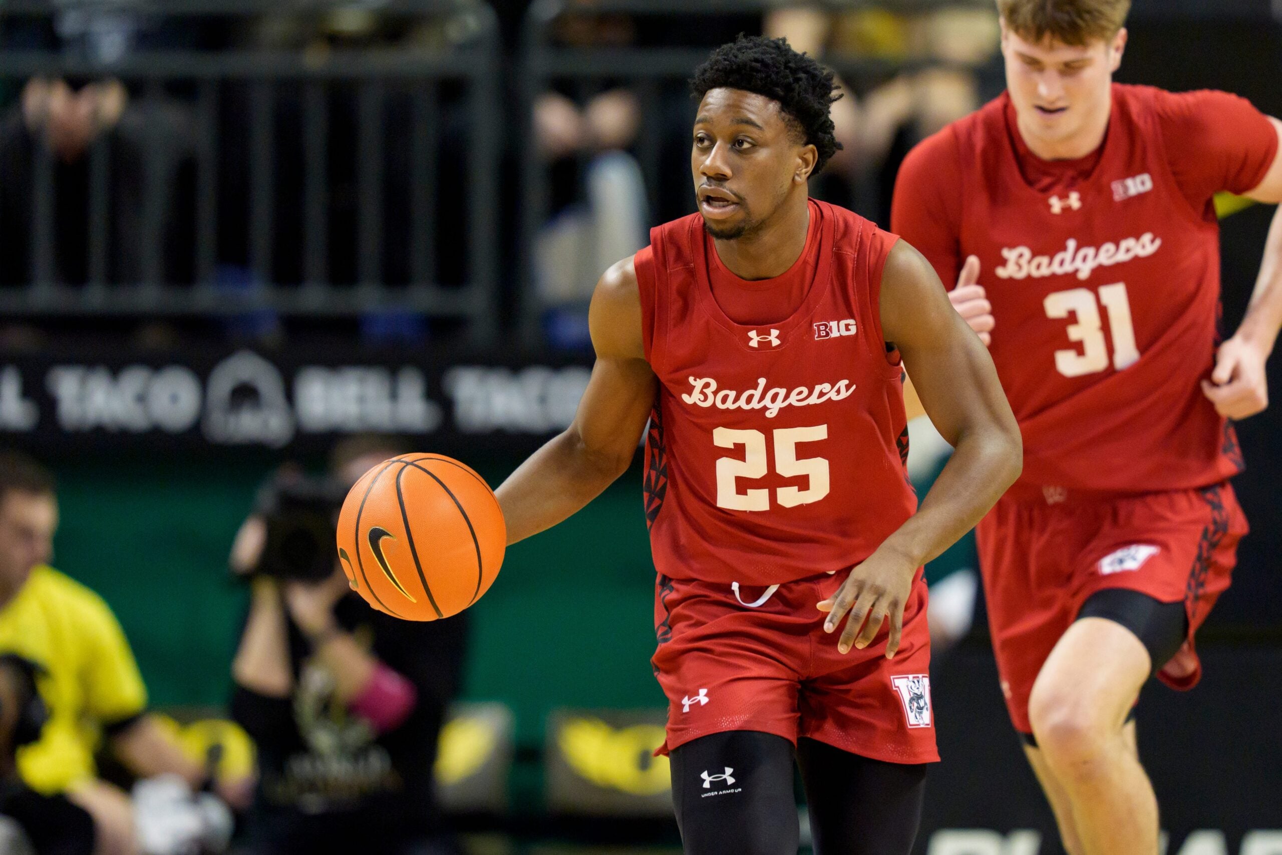 Wisconsin guard John Blackwell moves the ball up the court as the Oregon Ducks host the Wisconsin Badgers on Feb. 25, 2026, at Matthew Knight Arena in Eugene, Oregon.