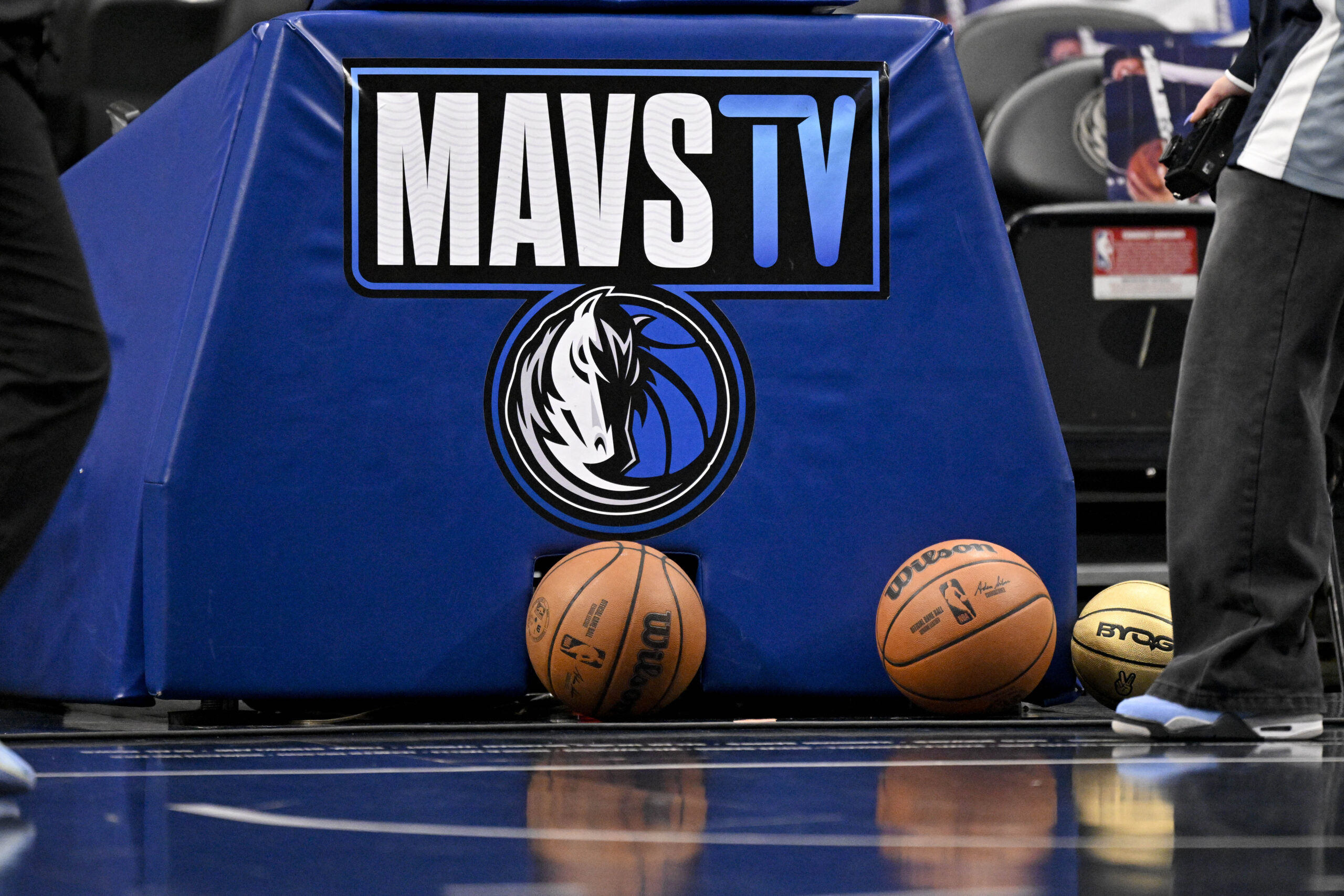 Feb 27, 2026; Dallas, Texas, USA; A view of the Mavs TV logo and basketball before the game between the Dallas Mavericks and the Memphis Grizzlies at the American Airlines Center. Mandatory Credit: Jerome Miron-Imagn Images