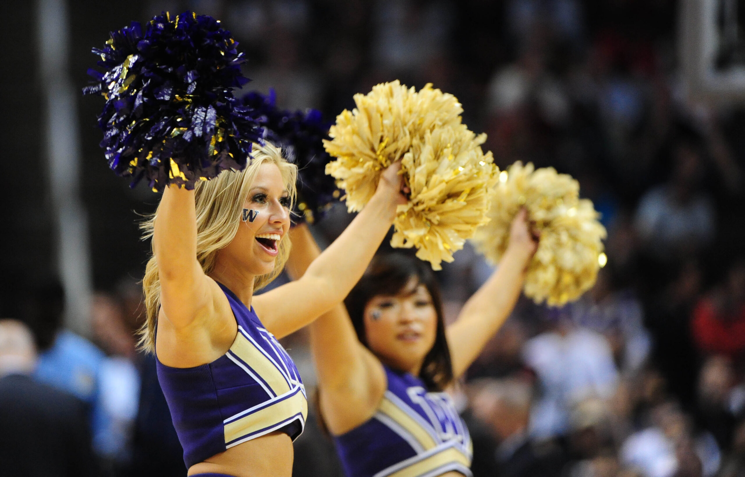 March 18, 2010; San Jose, CA, USA; Washington Huskies cheerleaders perform during the second half against the Marquette Golden Eagles in the first round of the 2010 NCAA mens basketball tournament at HP Pavilion. The Huskies defeated the Golden Eagles 80-78. Mandatory Credit: Kyle Terada-Imagn Images
