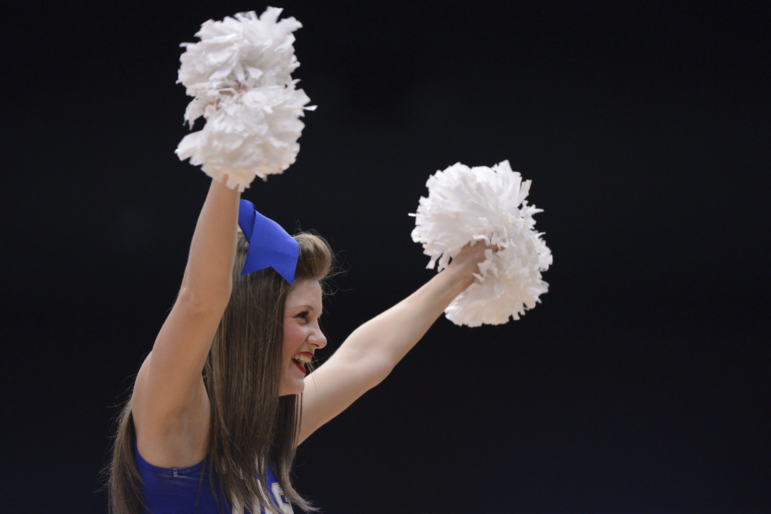 March 24, 2013; Stanford, CA, USA; Tulsa Golden Hurricane cheerleader performs against the Stanford Cardinal during the second half of the first round of the 2013 NCAA womens basketball tournament at Maples Pavilion. Stanford defeated Tulsa 72-56. Mandatory Credit: Kyle Terada-Imagn Images