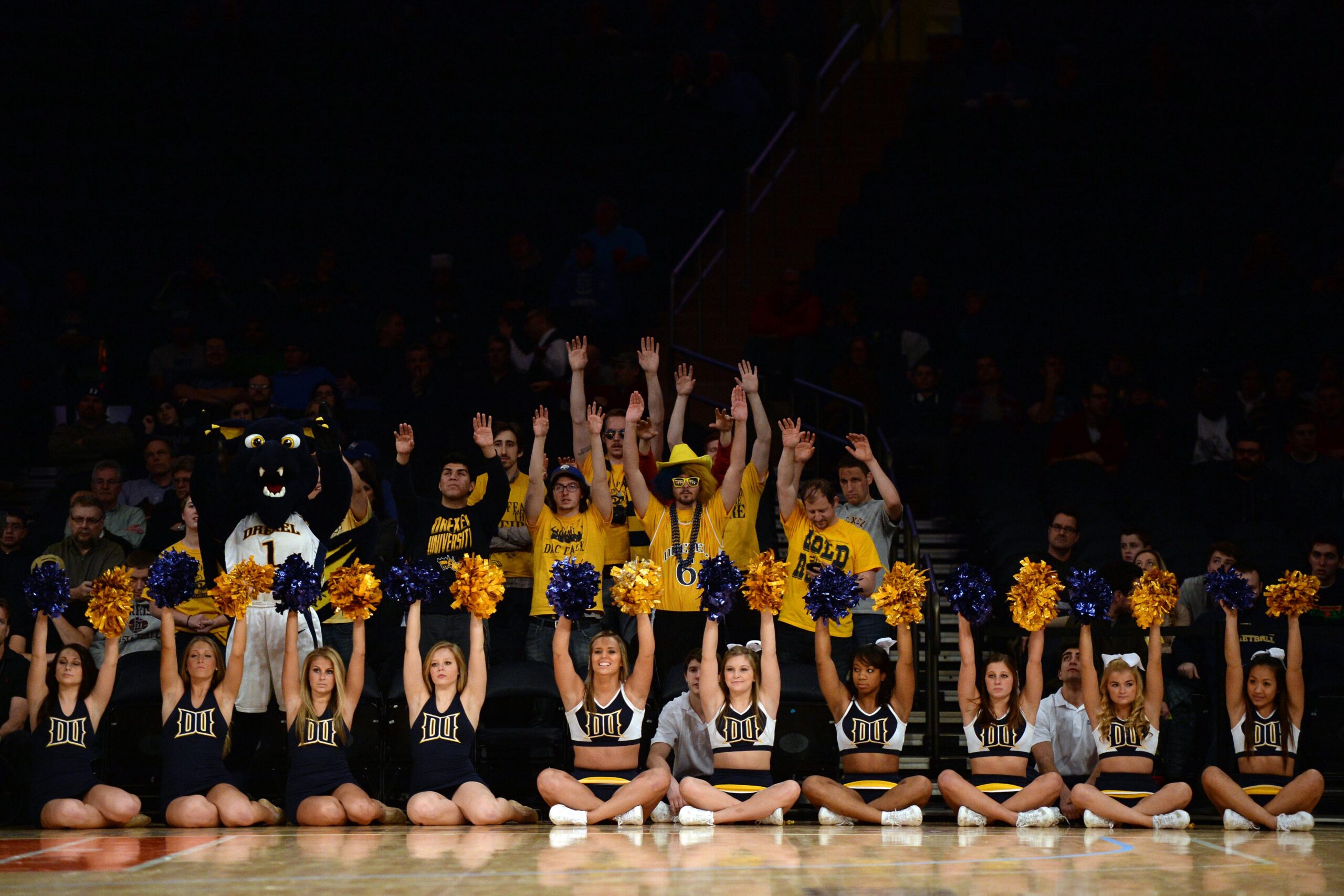 Nov 29, 2013; New York, NY, USA; Drexel Dragons fans and cheerleaders look on against the Alabama Crimson Tide during the NIT Season Tip-Off at Madison Square Garden. Drexel won the game 85-83 in triple overtime. Mandatory Credit: Joe Camporeale-Imagn Images