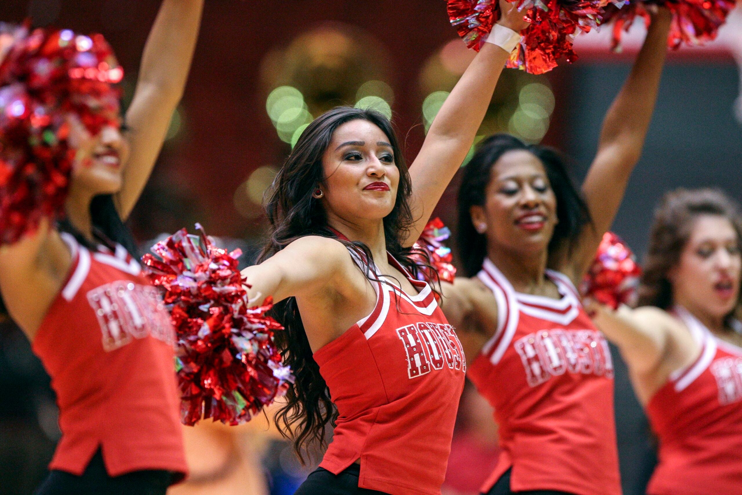 Jan 7, 2014; Houston, TX, USA; Houston Cougars cheerleaders perform before a game against the Cincinnati Bearcats at Hofheinz Pavilion. Mandatory Credit: Troy Taormina-Imagn Images