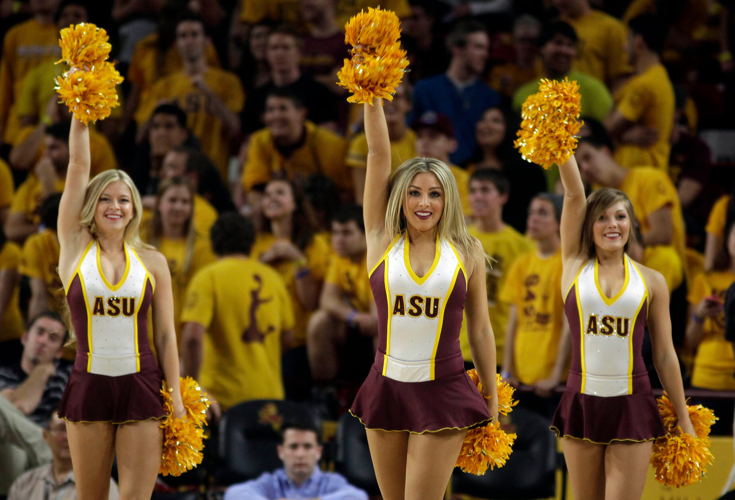 Feb 26, 2014; Tempe, AZ, USA; Arizona State Sun Devils cheerleaders perform during the first half against the Stanford Cardinal at Wells Fargo Arena. Mandatory Credit: Rick Scuteri-Imagn Images