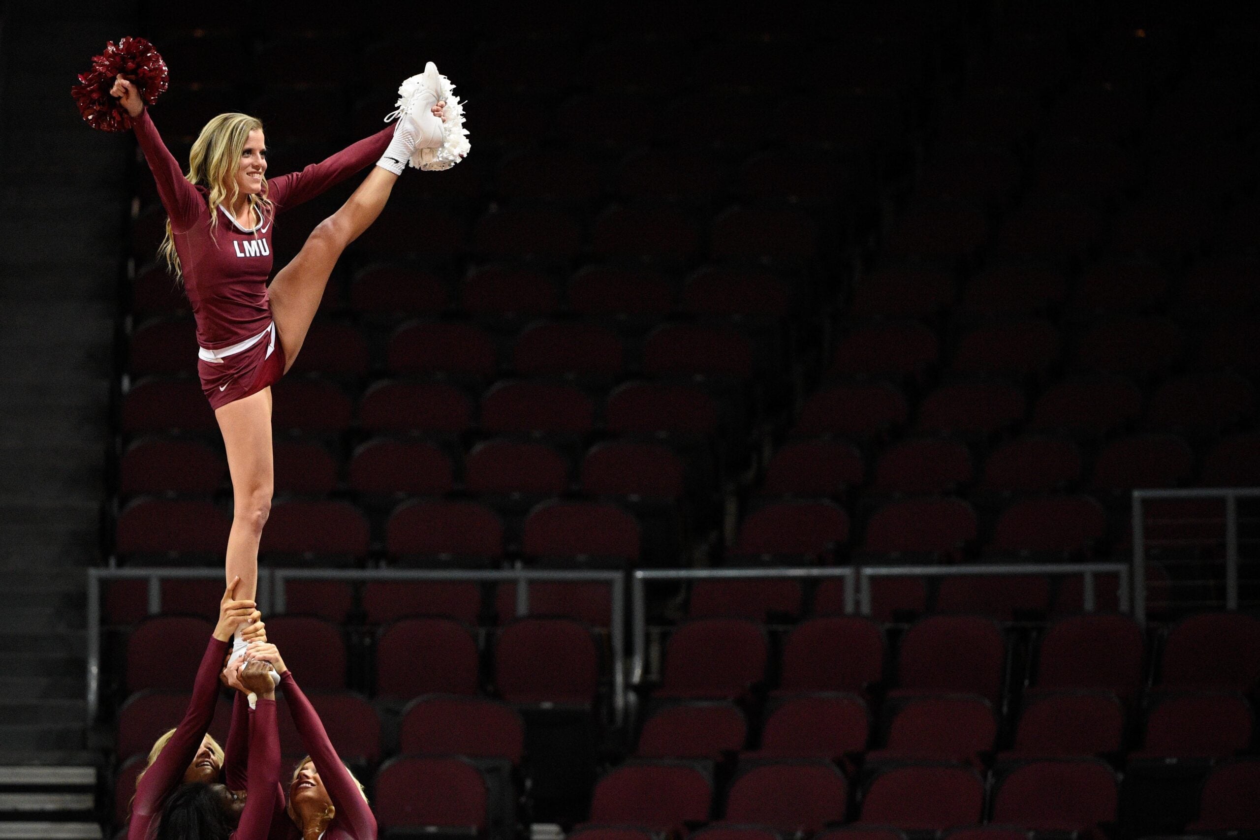 March 5, 2015; Las Vegas, NV, USA; Loyola Marymount Lions cheerleaders perform against the Pepperdine Waves during the second half in the first round of the West Coast Conference tournament at Orleans Arena. The Lions defeated the Waves 68-67. Mandatory Credit: Kyle Terada-Imagn Images