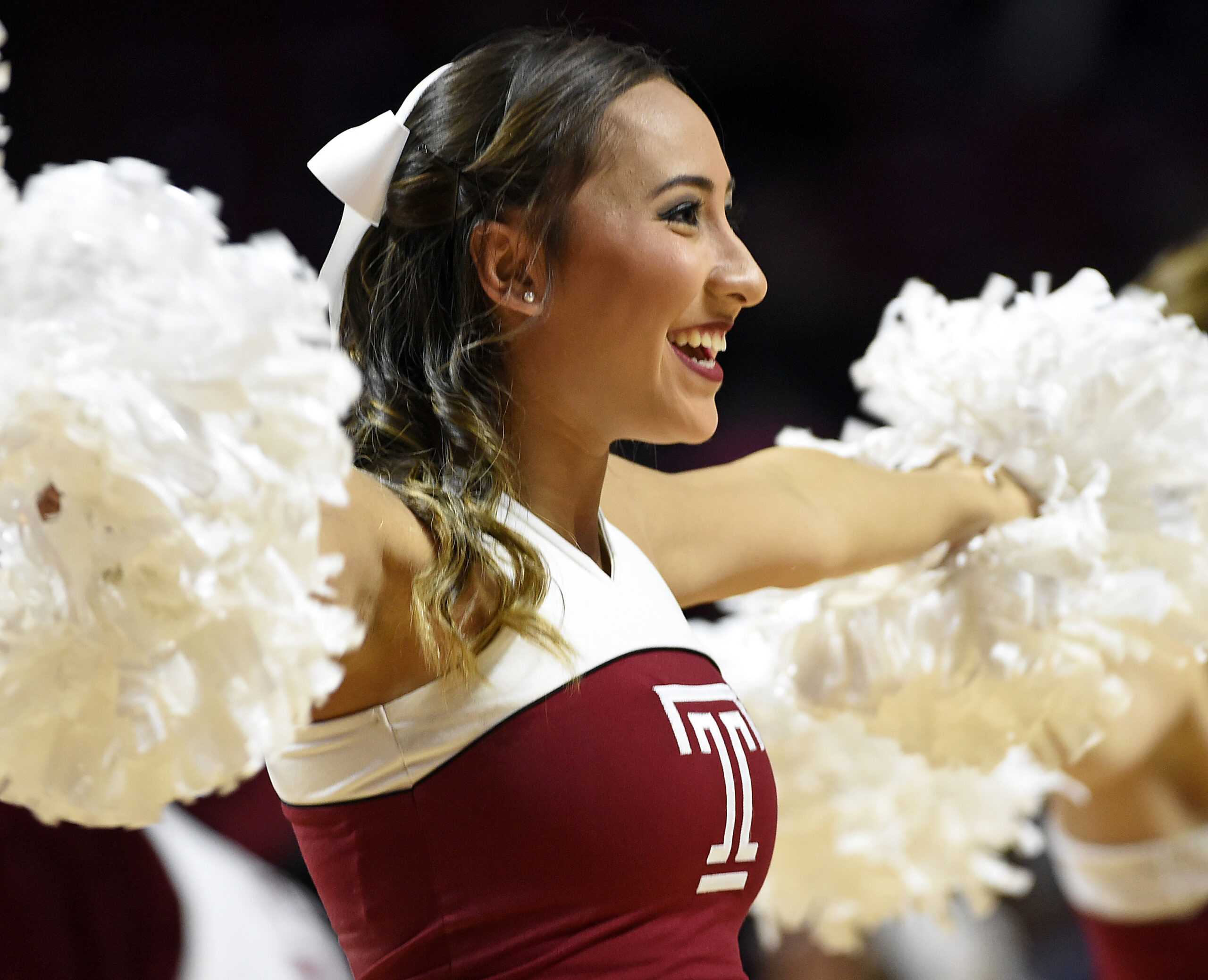 Nov 29, 2015; Philadelphia, PA, USA; Temple Owls cheerleader performs during a timeout against the Delaware Fightin Blue Hens the first half at Liacouras Center. Mandatory Credit: Eric Hartline-Imagn Images