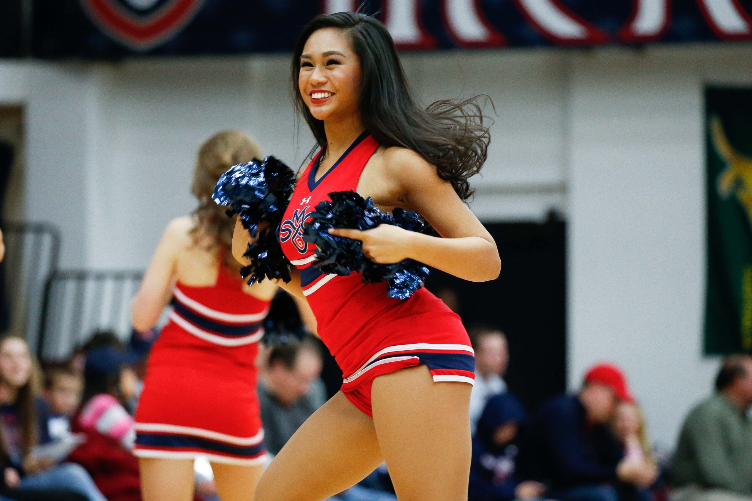 Dec 31, 2016; Moraga, CA, USA;  St. Mary's Gaels cheerleader performs during the game against San Diego Toreros in the second half at McKeon Pavilion. The St. Mary's Gaels defeated the San Diego Toreros 72-60. Mandatory Credit: Stan Szeto-Imagn Images