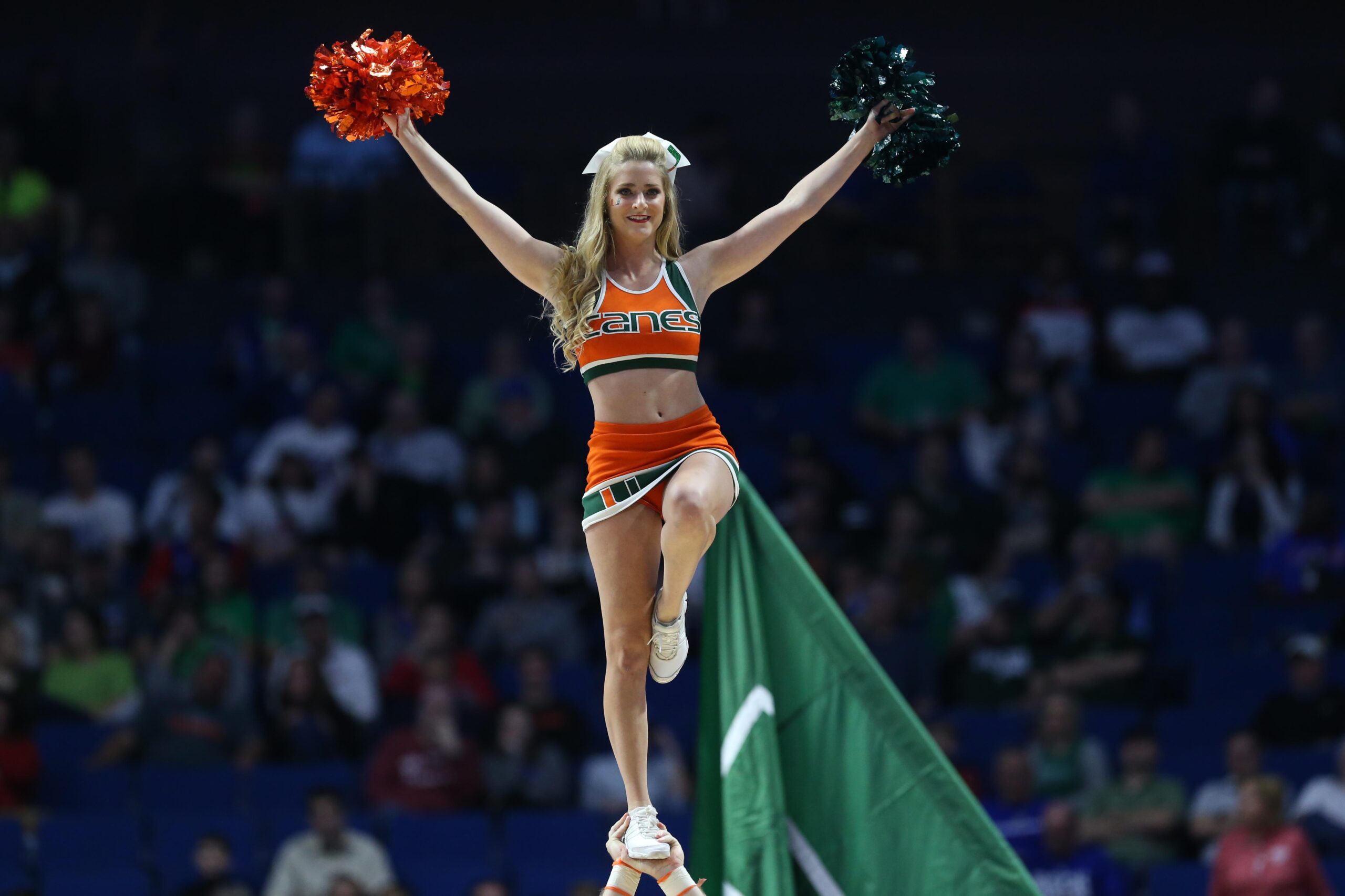 Mar 17, 2017; Tulsa, OK, USA; Miami Hurricanes cheerleaders perform during the first half against the Michigan State Spartans in the first round of the 2017 NCAA Tournament at BOK Center. Mandatory Credit: Kevin Jairaj-Imagn Images