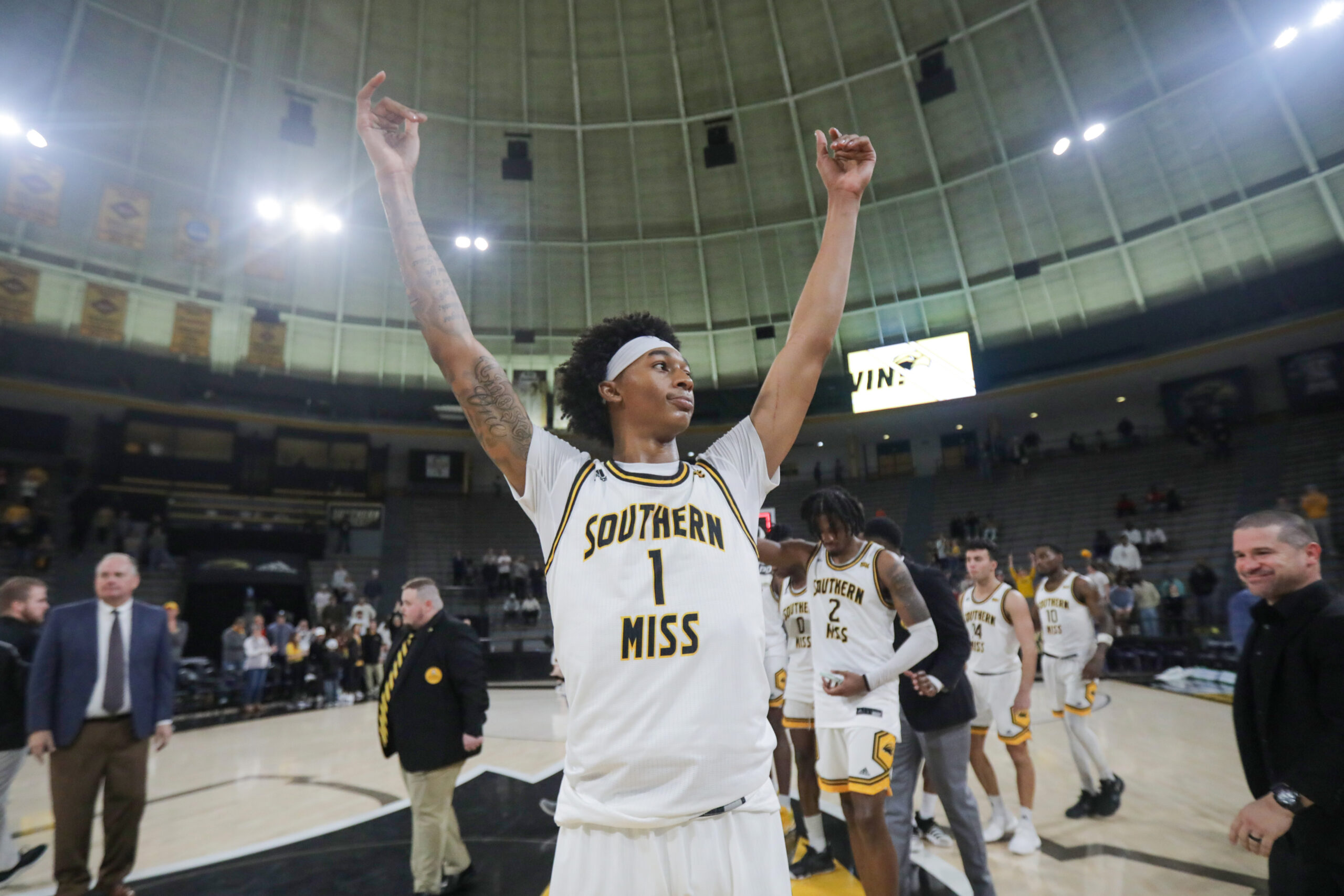 Jan 6, 2024; Hattiesburg, Mississippi, USA; Southern Miss Golden Eagles guard Austin Crowley (1) celebrates their win over the James Madison Dukes at Reed Green Coliseum. Mandatory Credit: Chuck Cook-Imagn Images