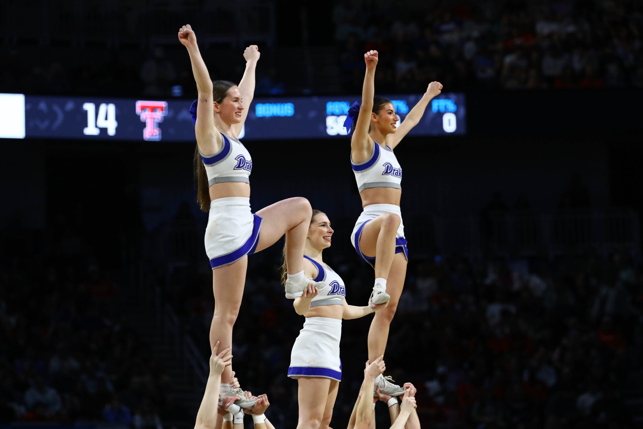 Mar 22, 2025; Wichita, KS, USA; Drake Bulldogs cheerleaders perform during the first half at Intrust Bank Arena. Mandatory Credit: Nick Tre. Smith-Imagn Images