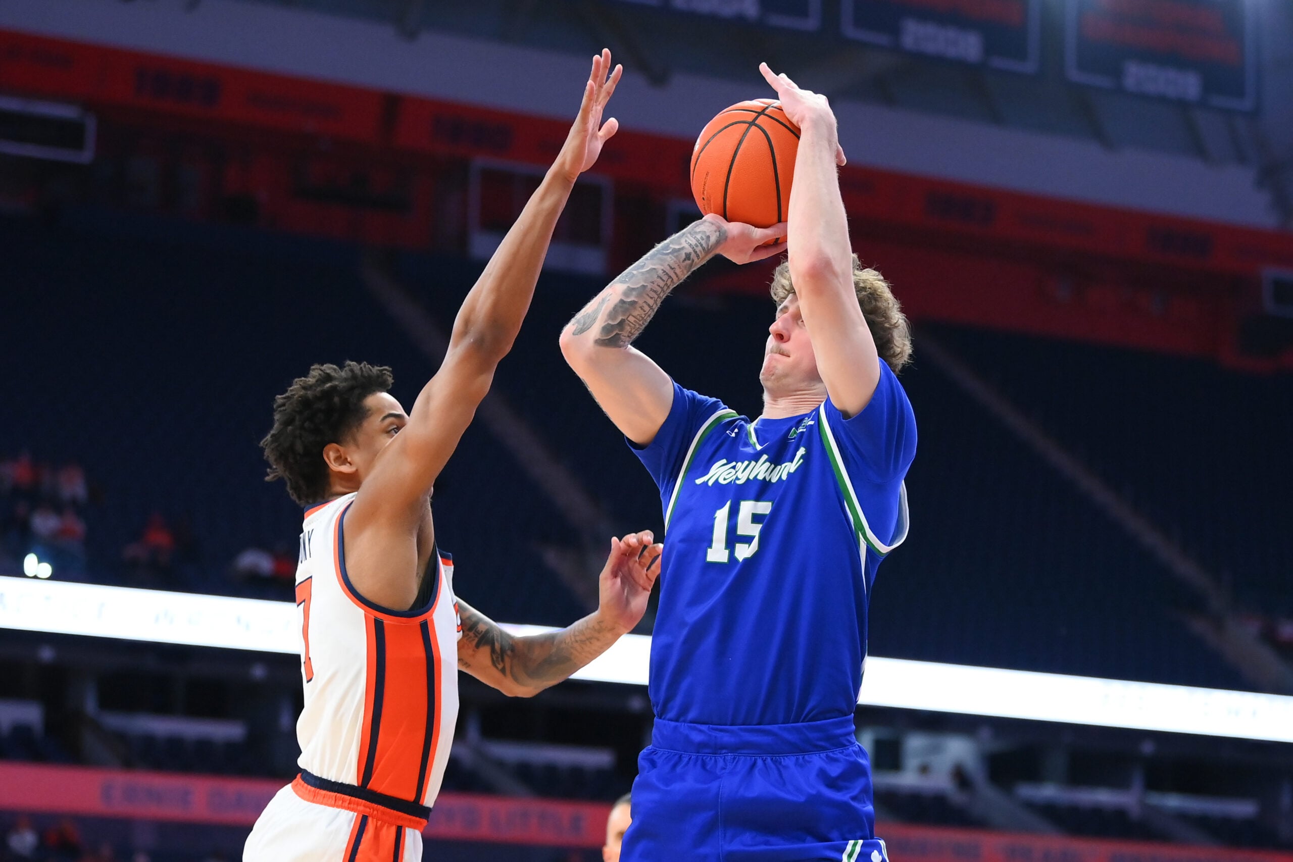 Dec 17, 2025; Syracuse, New York, USA; Mercyhurst Lakers guard Kaden Fuhrmann (15) shoots against Syracuse Orange guard Kiyan Anthony (7) during the first half at the JMA Wireless Dome. Mandatory Credit: Rich Barnes-Imagn Images