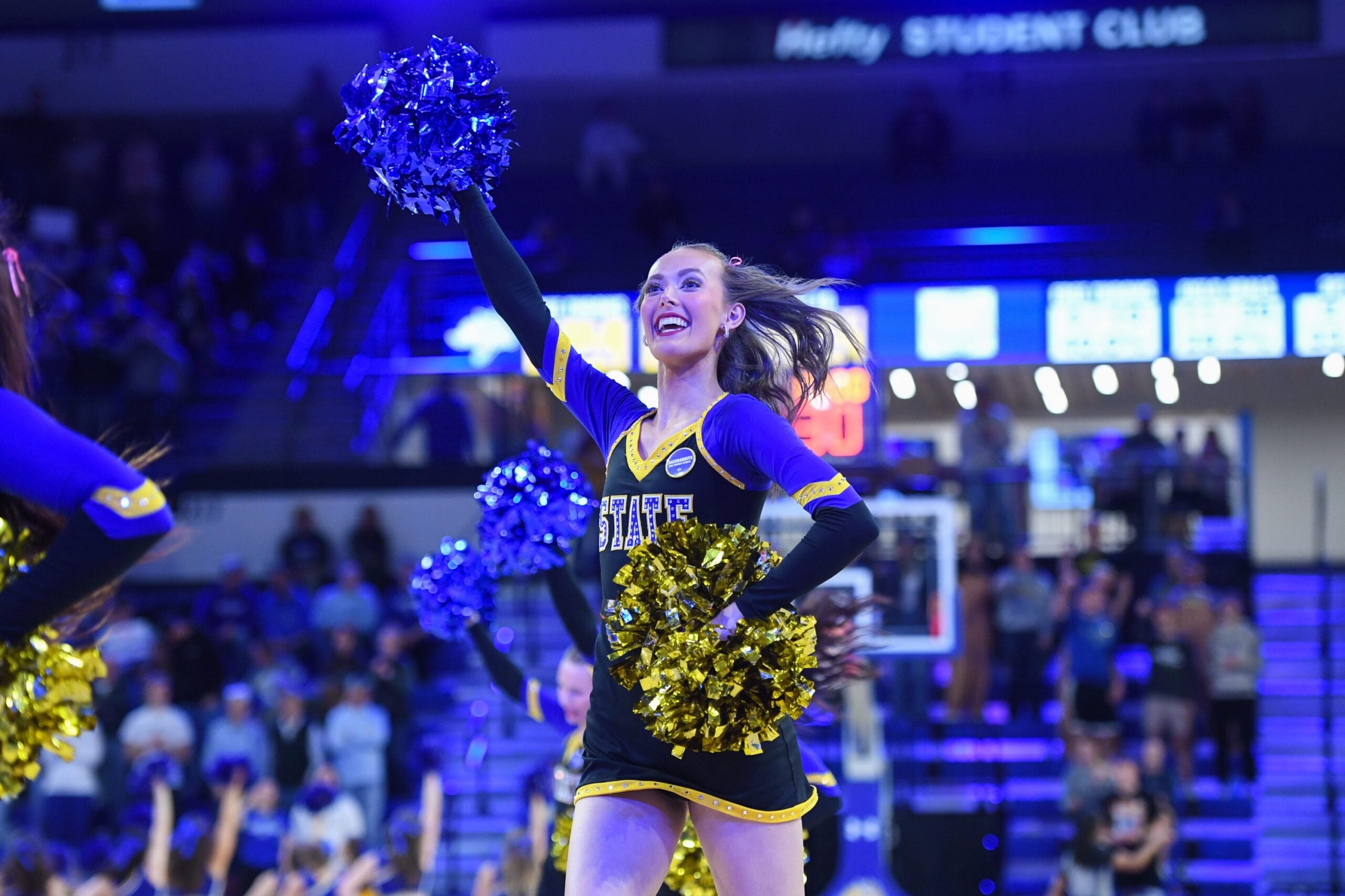 South Dakota State Jackrabbits cheerleader runs off court during timeout during game against the Kansas City Roos on Saturday, Feb. 14, 2026, at First Bank & Trust in Brookings, South Dakota.
